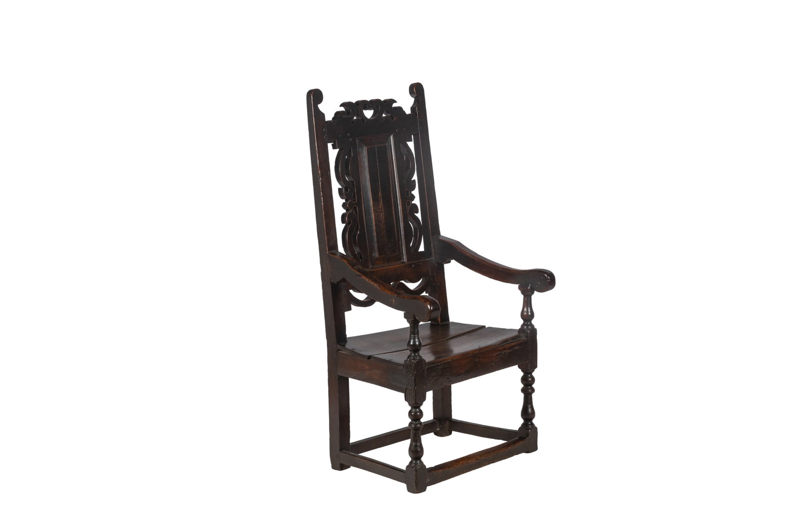 ENGLISH CHESHIRE BRANDED ARMCHAIR, ca. 1700: English oak armchair with pierced scrolls to the crest rail and also surrounding the raised back panel. Baluster turned arm supports and front legs joined by boxstretchers. Lancashire/Cheshire origin,