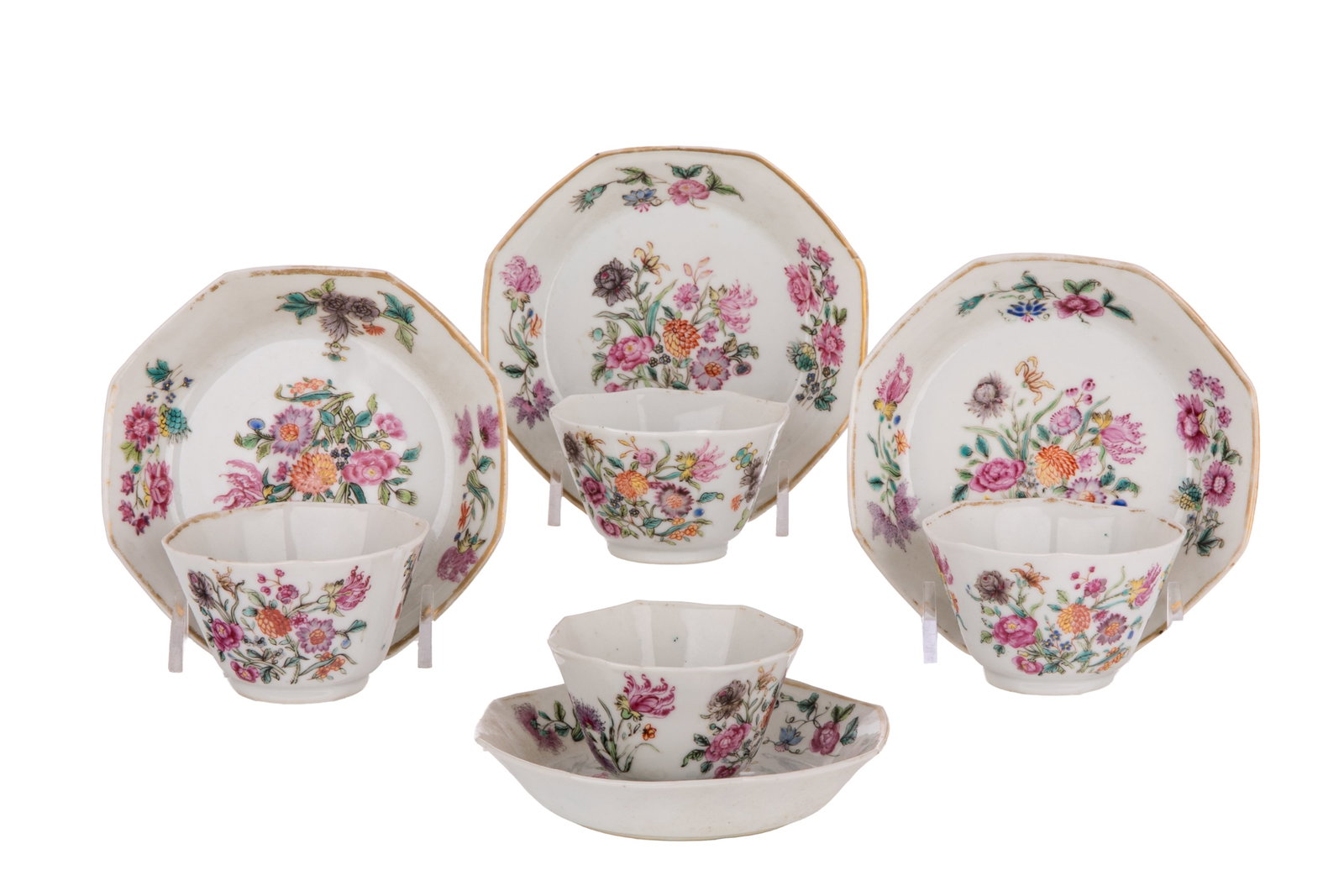 FOUR FAMILLE ROSE OCTAGONAL CUPS & SAUCERS: Chinese porcelain octagonal form cups and saucers with fine enamel painted flowers and gilded accents, Qing dynasty, 18th / 19th C. Diam. (cup) 6.7 cm; (saucer) 11.5 cm