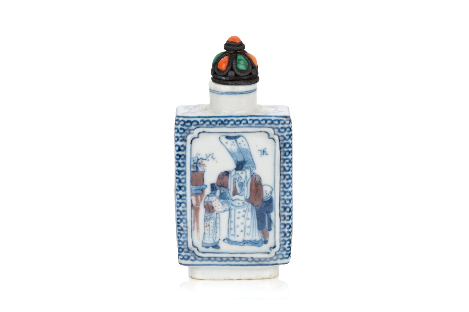 BLUE & WHITE & COPPER RED SCHOLARS SNUFF BOTTLE: Of rectangular form. Two wider sides decorated with a scene of scholar and their attendants in panels, and the two narrower sides with inscriptions. Four-characterQianlong mark to the underside. Coral