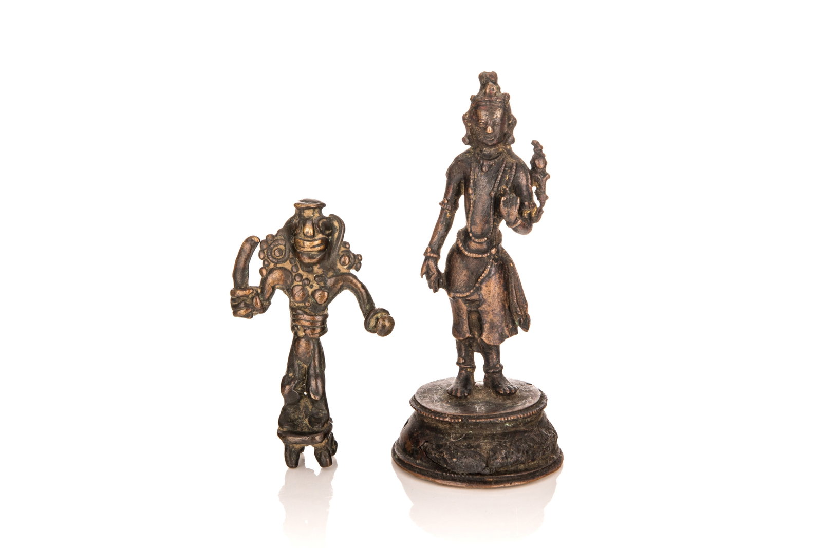 TWO INDIAN SMALL BRONZE ALTAR FIGURES: Including a Pala style standing Bodhisattva with right hand in varada mudra and left hand in vitarka mudra on an elevated base; and a standing Durga holding a sword and a chakra,India, Himachal Prades
