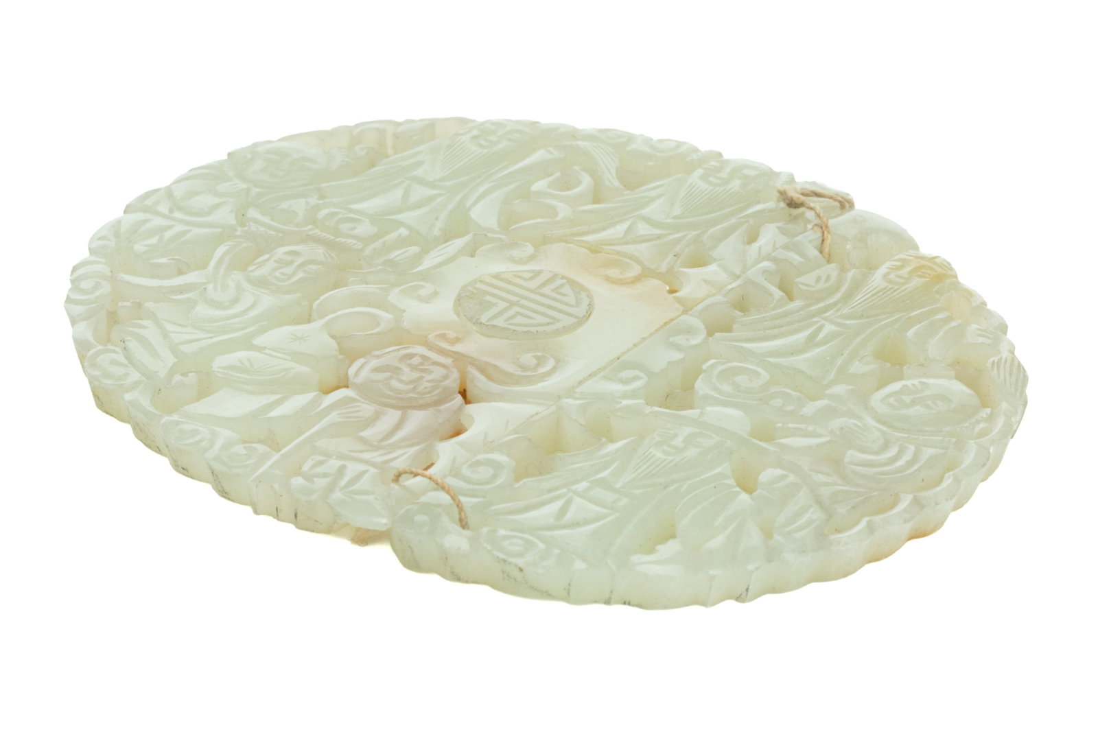 WHITE JADE TWO-PART DAOIST IMMORTALS BUCKLE: Carved in openwork with eight Daoist Immortal figures, the hook with a shou roundel. On fitted carved wood stand. Qing dynasty, 19th Century. W. 8 cm