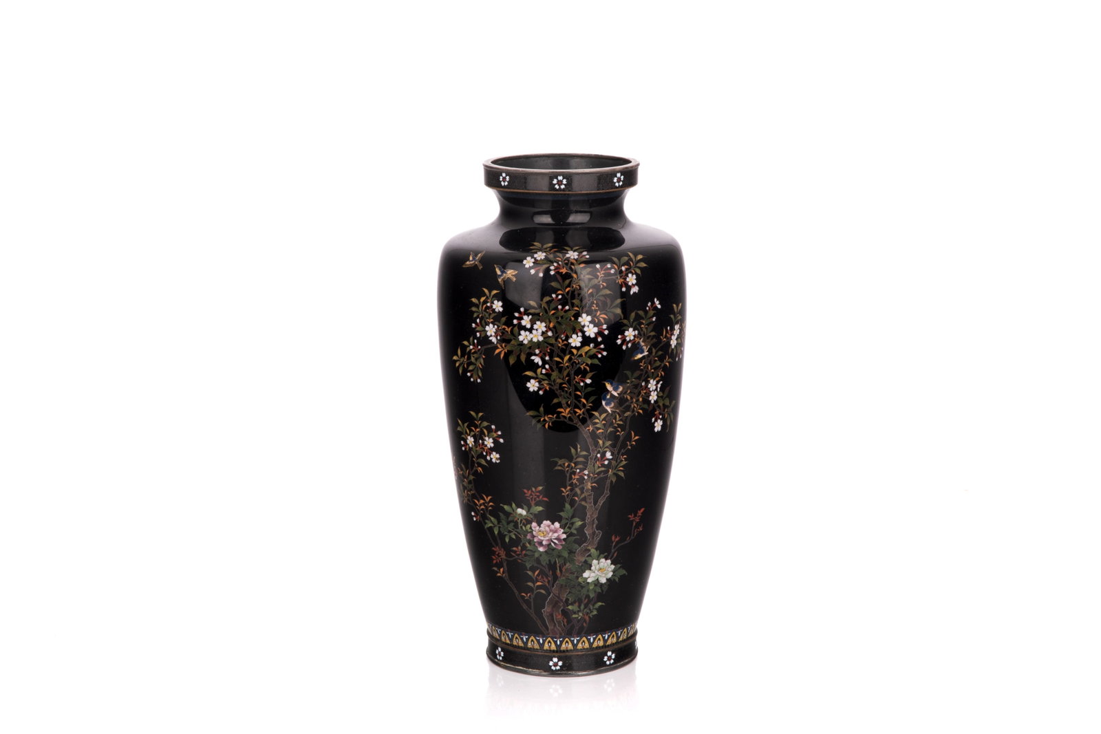 FINE MEIJI PERIOD JAPANESE CLOISONNE VASE: Black ground vase with fine cloisonne blossoms and blue birds on silver wirework, geometric border, hallmark to silver rim on base. H 24.5cm (9 3/4in)