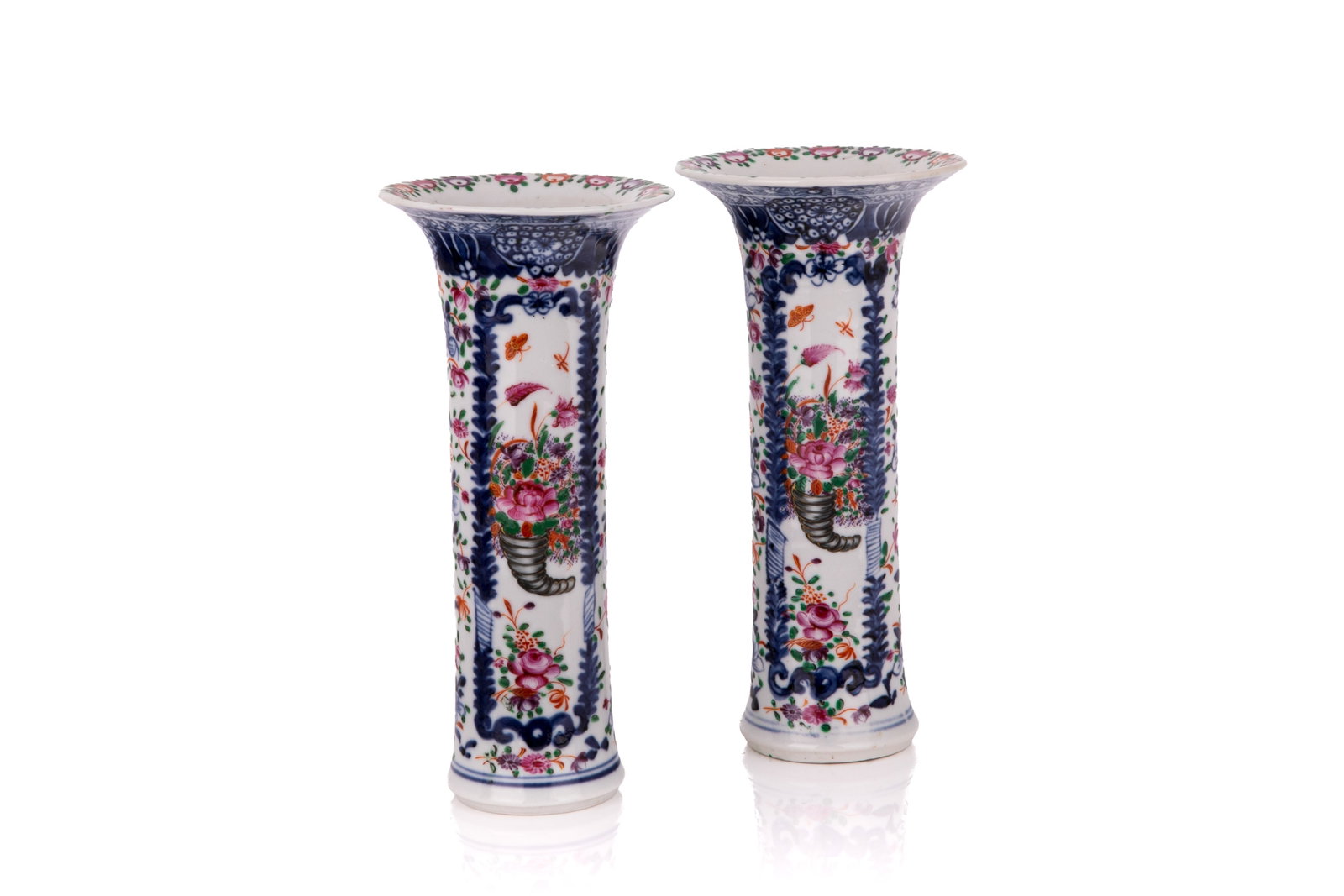 PAIR OF CHINESE EXPORT PORCELAIN VASES: Tall straight form with trumpet rim, cobalt blue underglaze with floral cornucopia in mixed polychrome. 18th C. H. 8in (20cm)