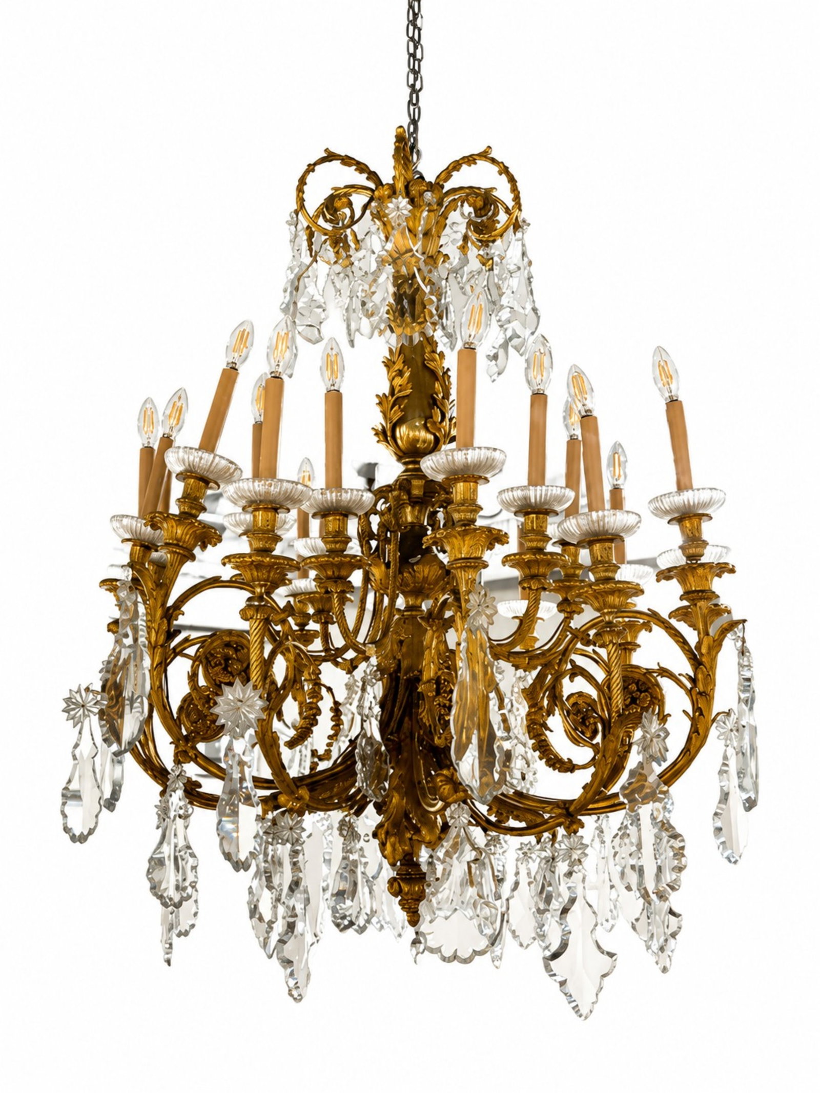 FINE FRENCH EMPIRE MULTI BRANCH ORMOLU CHANDELIER: An exceptional example gilt bronze fixture originally made for candles with electrical conversion to the exterior of the branches. The ball drop is present but needs repair to mount to be base. 18 lig