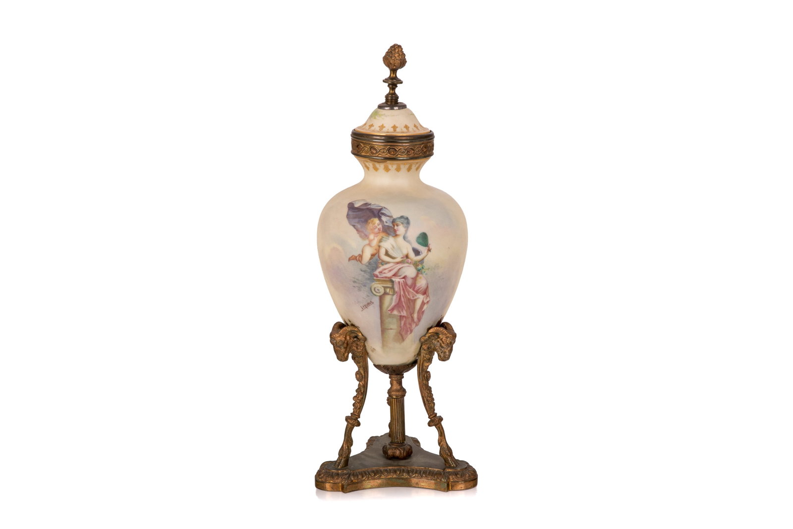 FRENCH PORCELAIN & BRONZE MOUNTED URN: French porcelain vase featuring hand-painted scenes, mounted on a decorative bronze stand with rams heads. Signed "Lesueur." 19th C. H. 18in x W. 6 3/4in (46cm x 17cm)
