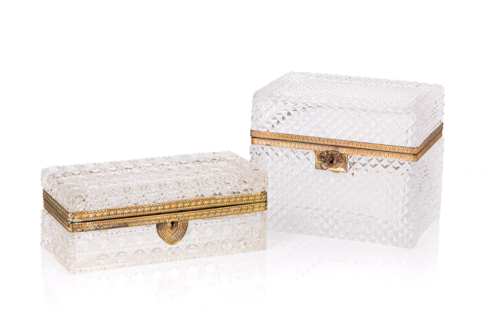 TWO CUT GLASS CASKET BOXES: Ech with brass mounts. H. 6in x W. 7 1/2in x D. 5 1/3in (15cm x 19cm x 13.5cm)