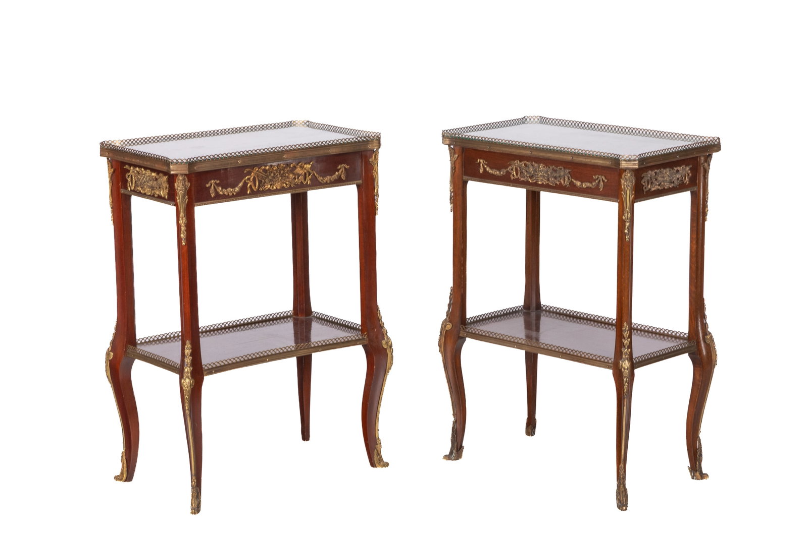 PAIR OF FRENCH MAHOGANY SIDE TABLES: Two tiered tables with figured bronze mounts and galleries. Table tops decorated with mixed inlay musical motifs surrounded by floral ribboning, early 20th C. H 29in x W 20in x D 12in
