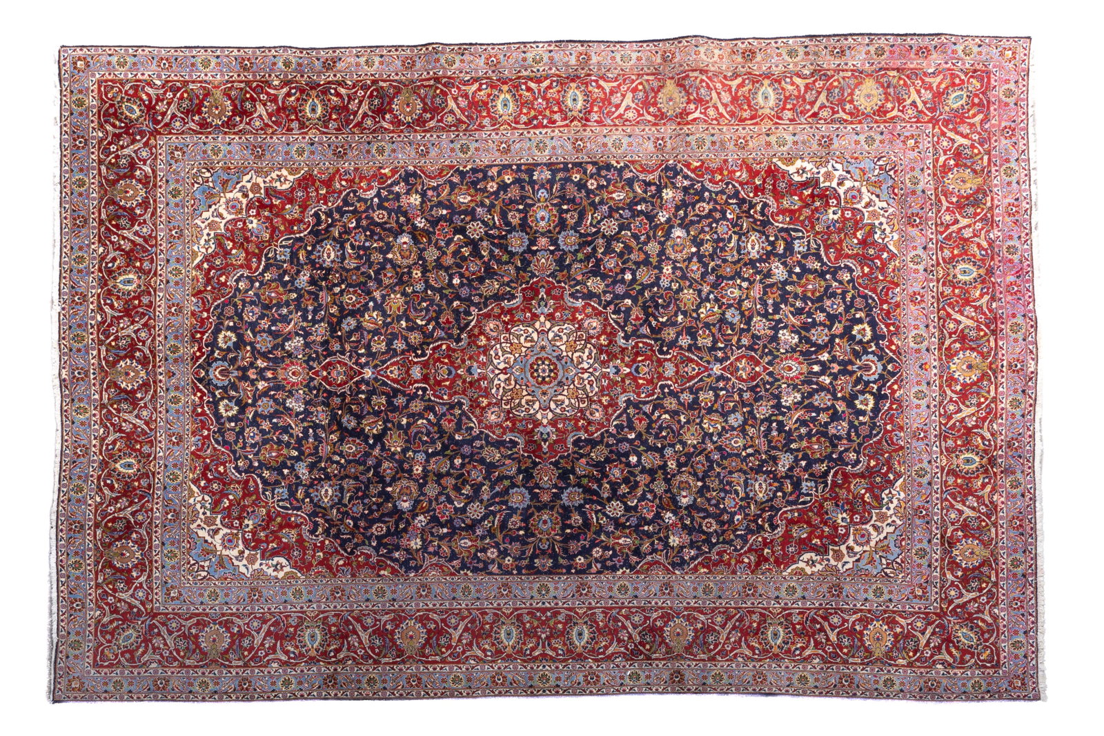 PERSIAN KASHAN CARPET MID 20TH: A fine Persian Kashan carpet with central medallion and dense all-over floral Shah Abbasi decoration. Finely woven with a very dense knotting and detailed floral drawing. 16ft 6in x 11ft 1in
