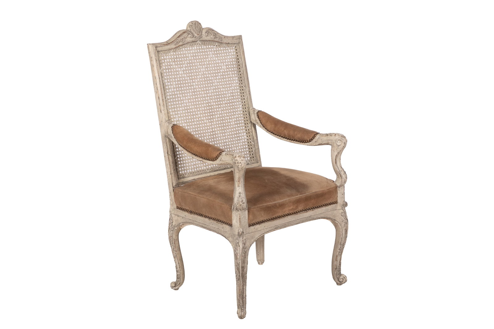 YALE R. BURGE WHITE WASHED CHAIR: Vintage brown suede upholstery and studding, caned back. H 42in x W 23in x D 20in