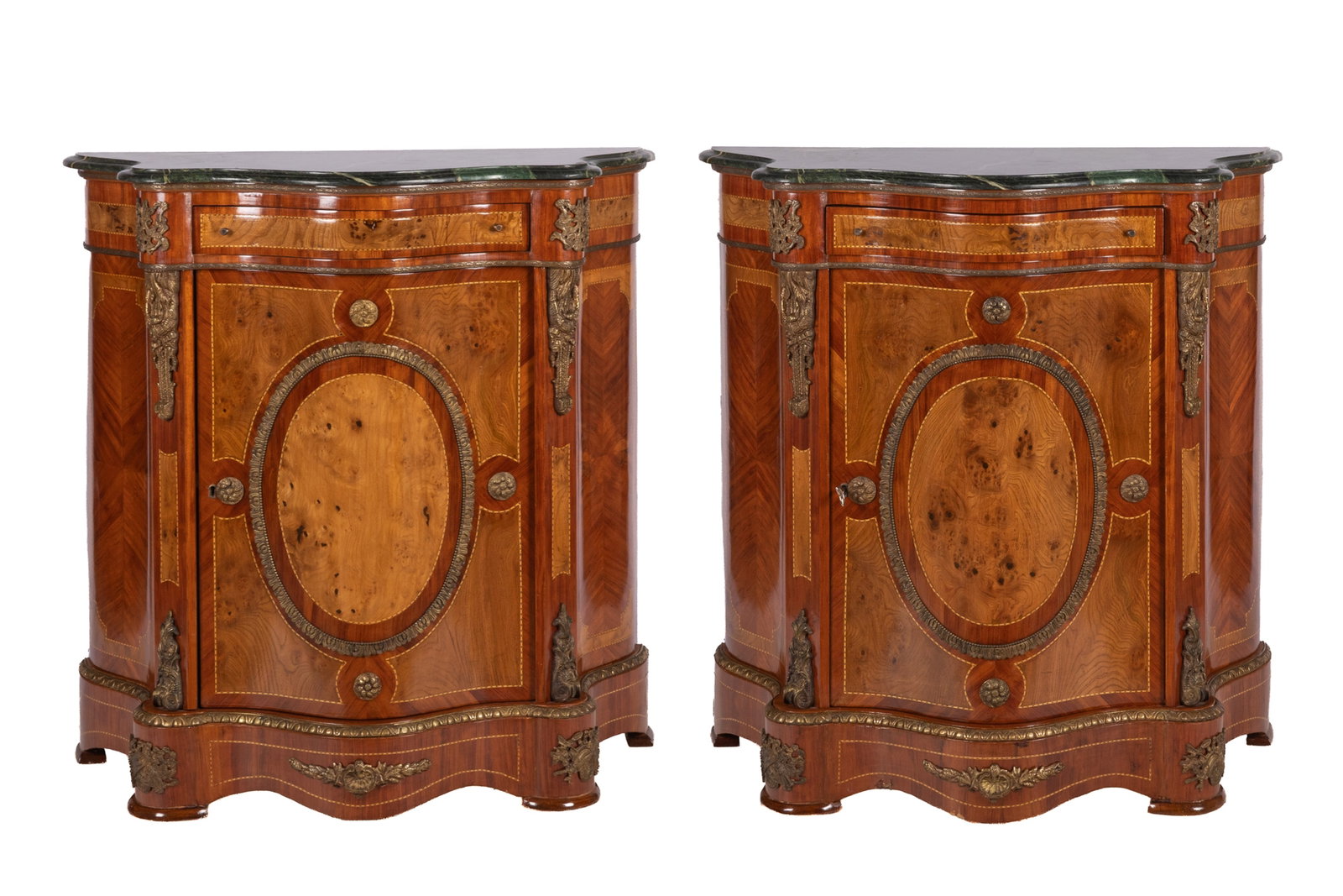 PAIR OF FRENCH MARBLE TOP CABINETS: In the Louis XV style, chevron fruitwood veneered body with burled details and satinwood banding, bronze mount, green marble tops, French, early 20th C. H 40in x W 38in x D18in