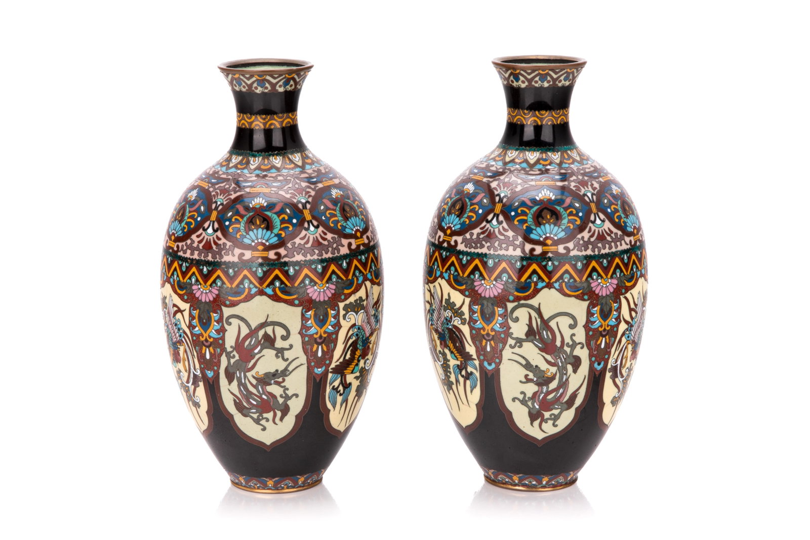 PAIR OF JAPANESE CLOISONNE VASES: Mixed coloured inlay with goldstone highlights, panels of mythical beasts, phoenix and dragons. Copper rims, unmarked, Japanese, Meiji period, late 19th C. H 25cm (9 3/4in)