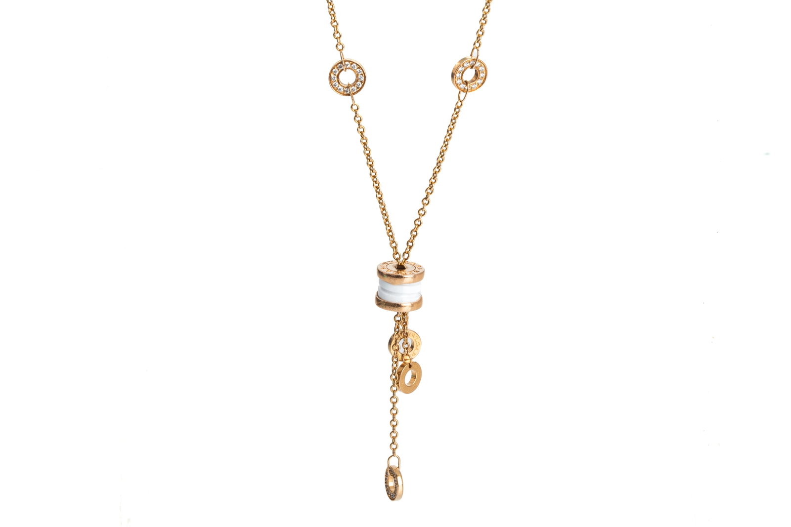 BVLGARI B.zero1 TASSEL LAVALIER NECKLACE 16.7g: BVLGARI B.zero1 18K Rose Gold Diamond and White Ceramic Tassel Lavalier Necklace. Made in Italy, serial number CELWHH. Measuring 16 to 18 inches wearable length. Centerpiece measuring 54mm long. Ceram