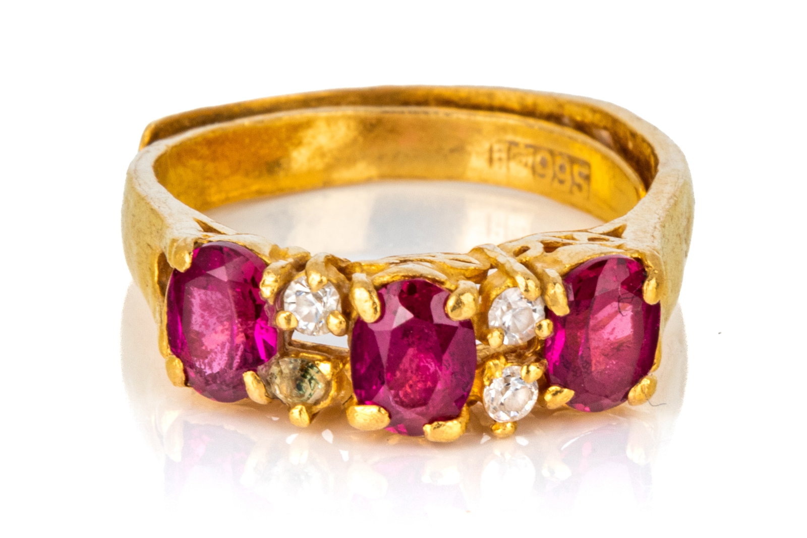 99.5% FINE CHINESE GOLD & GEMSTONE WRAP RING 4.8g: 99.5% fine gold wrap ring measuring 5.4mm wide by 5.3mm tall. Featuring red and colourless synthetic gems. Size 6 (approximate) 4.8 grams