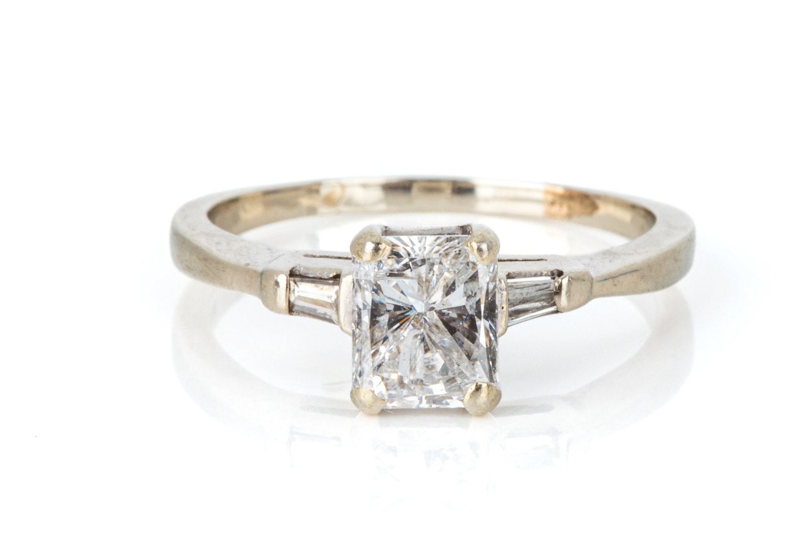 14K 0.75ct I1-FG RADIANT CUT DIAMOND RING 2.5g: 14K white gold diamond engagement ring measuring 2.2mm wide at shoulders. Featuring 1 radiant cut diamond measuring approximately 6.21mm x 5.20mm, estimated weight 0.75ct of I1-FG quality. Accented
