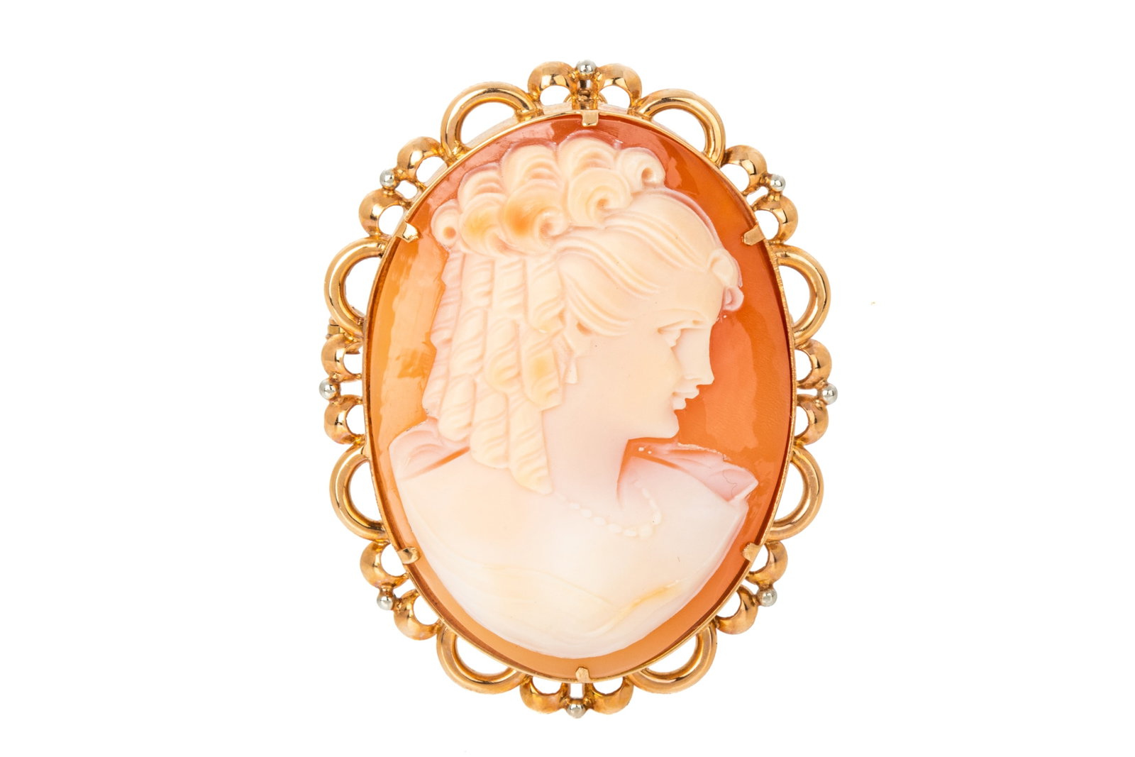 18K GOLD CAMEO BROOCH/PENDANT 12.7g: 18K yellow gold shell cameo brooch/pendant measuring 58.7mm long (with bail) by 37mm wide. Equipped with modern hinge and roll-lock. 12.7 grams