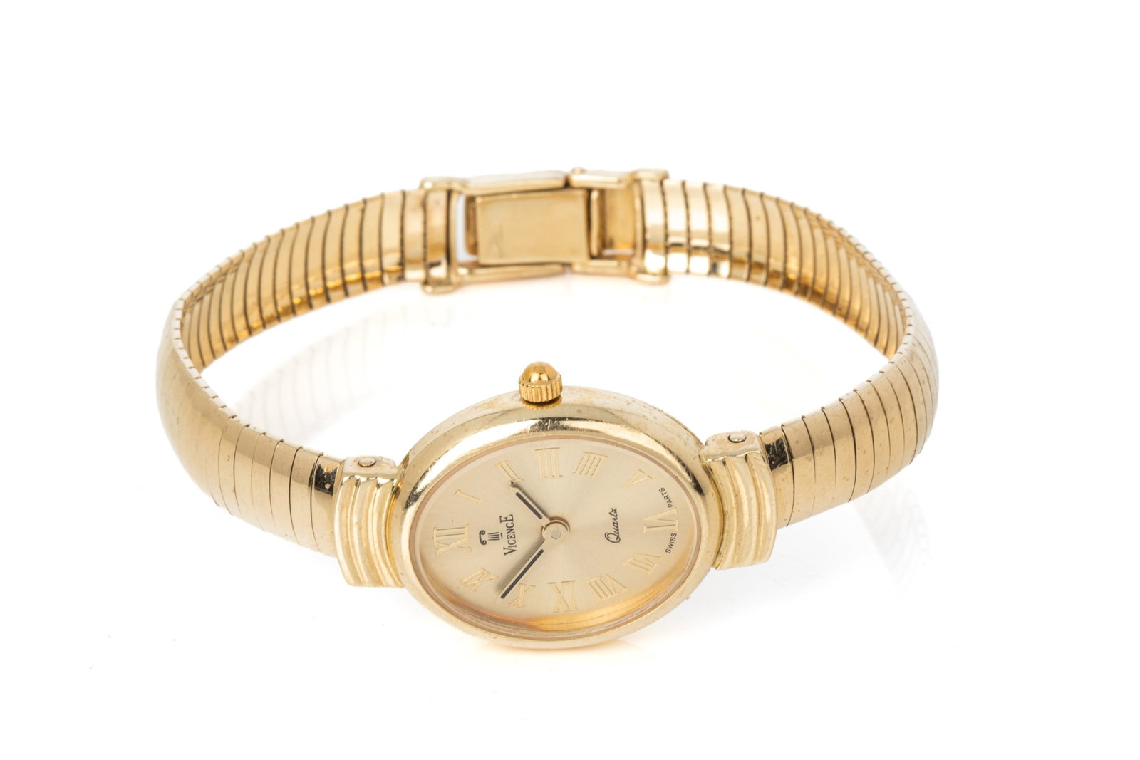 14K MILOR ITALIAN-MADE VICENCE QUATRZ WATCH 23.4g: 14K yellow gold Italian made Milor quartz watch labeled Vicence. Oval case measures 30.9mm long by 19.5mm wide. 14K yellow gold Milor bracelet measures 7-7.25 inches wearable length by 7.8mm wide, equ