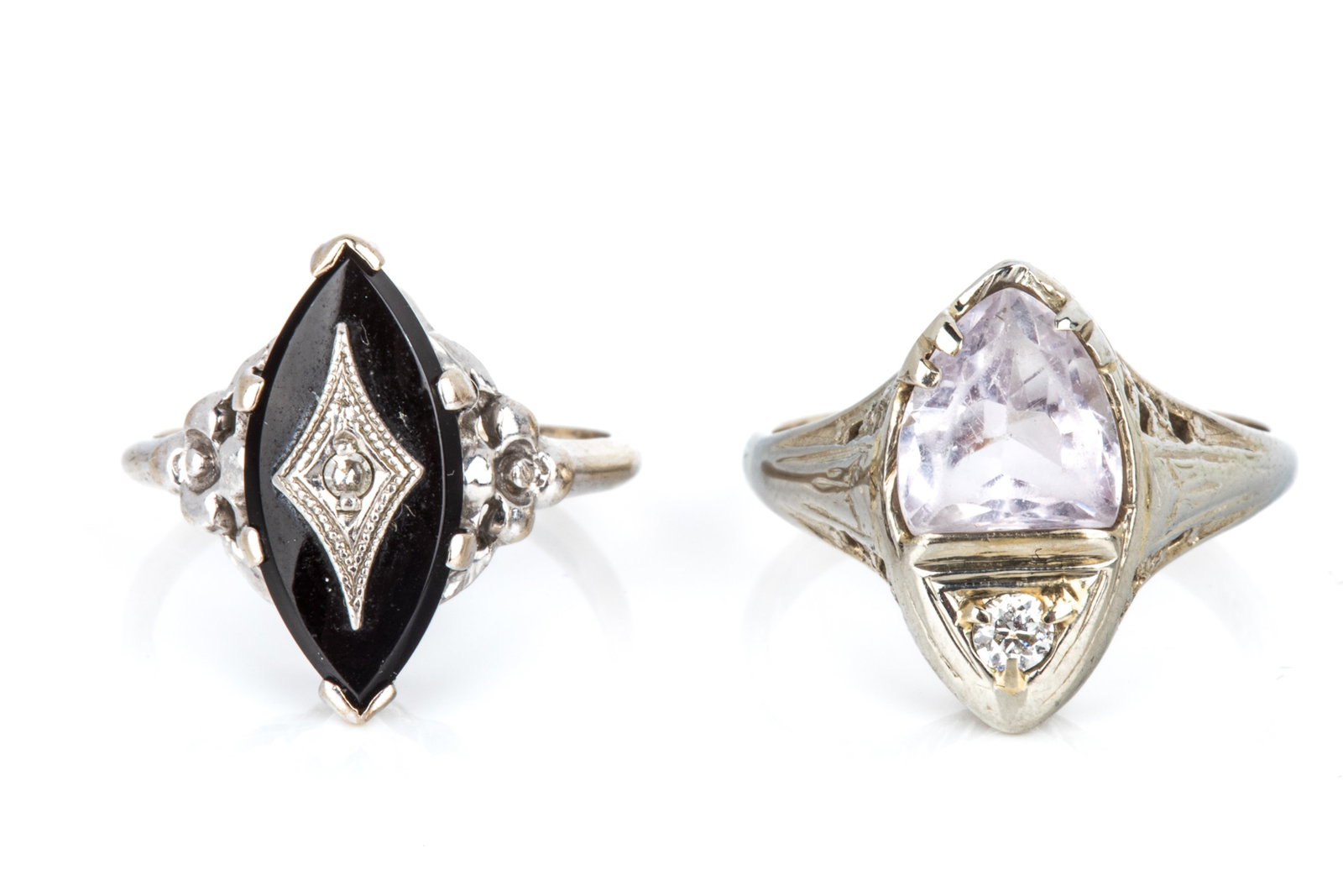 PAIR OF 10K GEMSTONE & DIAMOND RINGS 5.2g: Onyx and diamond ring measuring 15.6mm long. Size 4.25 2 grams Art Deco inspired diamond and pale amethyst (abraded) ring measuring 15.2mm long. Size 5.75 3.3 grams