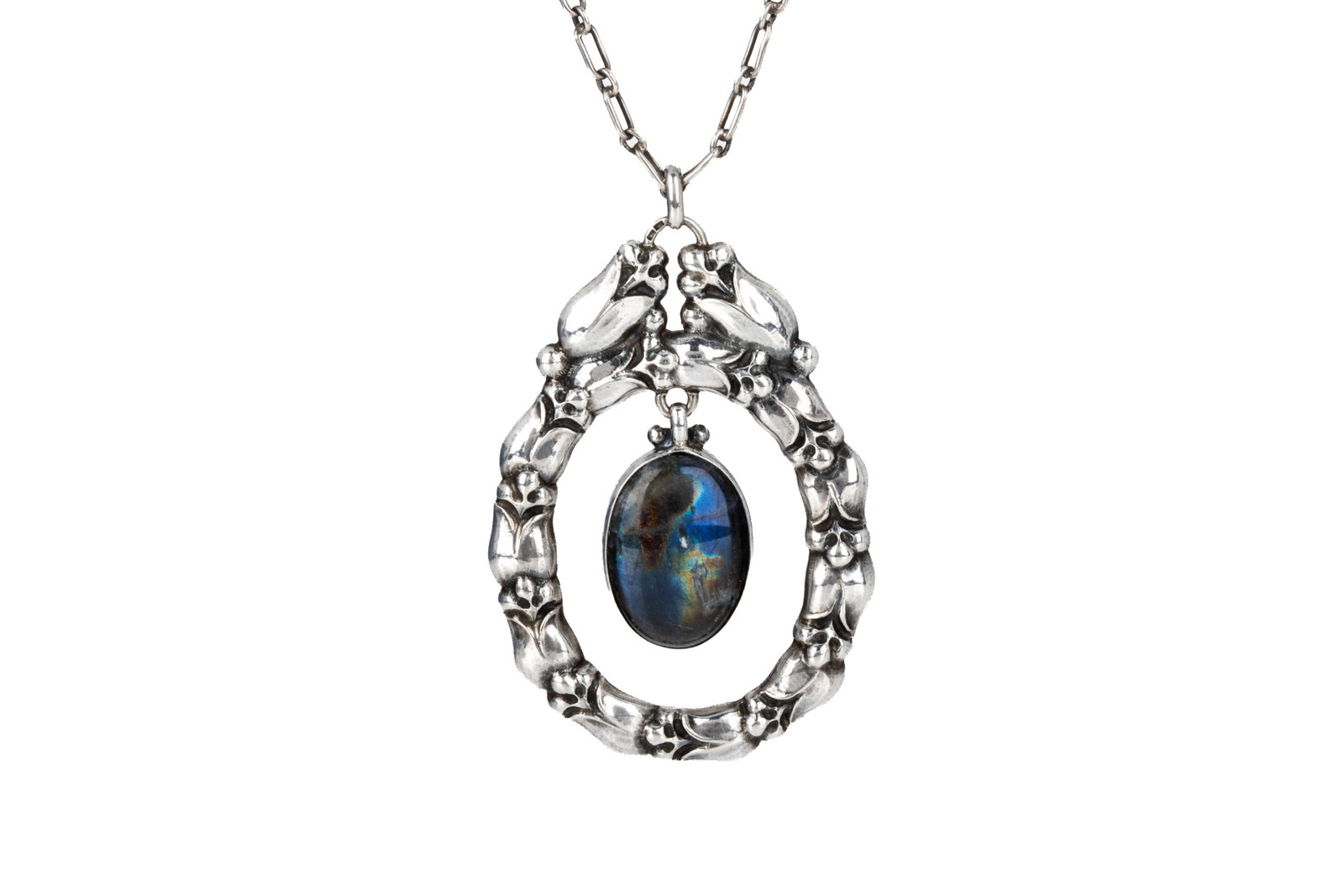 1919 GEORG JENSEN LABRADORITE NECKLACE, FOR PARIS: Antique George Jensen 830 silver necklace dating between 1918 - 1919, model 20, with rare "GJ" stamp in oval outline, divided by a medieval tower. Marked IMPORTE DE DANEMARK for import to George Jense
