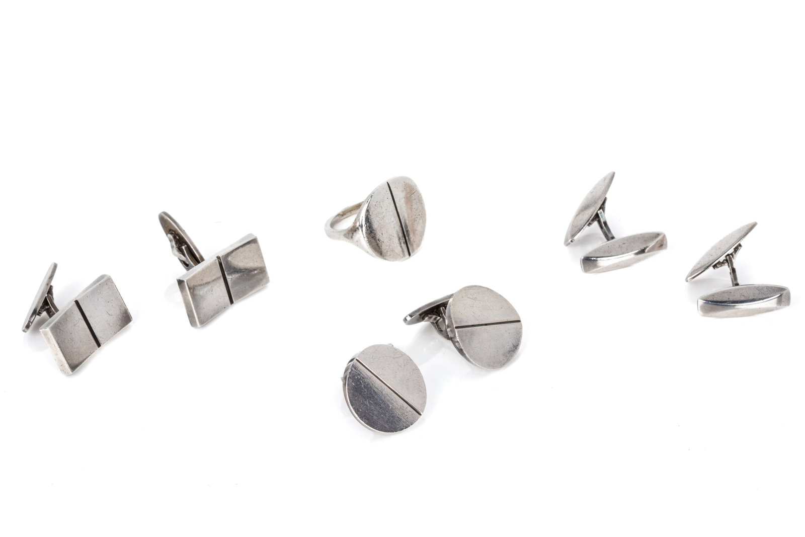 GEORG JENSEN CUFFLINKS & RING, 106, 101, 109, 90: Georg Jensen sterling silver grouping featuring ring model 101, measuring 20.8mm long. Finger size 9.75 (approximate). Also featuring round cufflinks model 106, measuring 21mm wide, equipped with fixe
