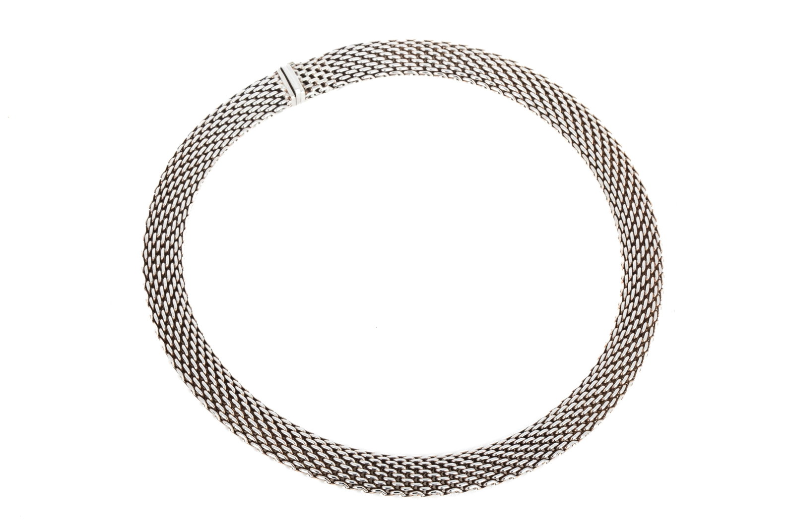 TIFFANY & CO. SOMERSET SILVER MESH NECKLACE, POUCH: Measuring 17.25 inches long by 12.3mm wide by 4.3mm thick. Equipped with heavy box catch and safety lock. 84 grams Accompanied by original pouch.