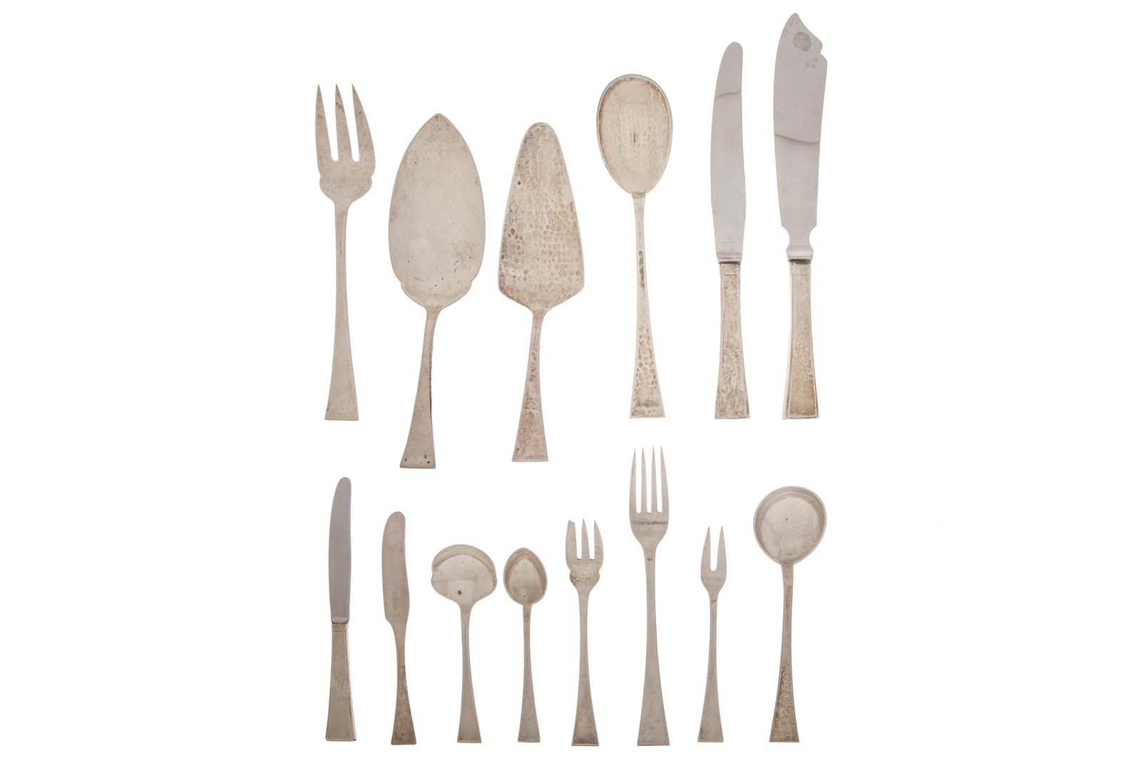 CARL POUL PETERSEN FLATWARE SET 1997g: A sterling silver flatware set from the workshop of Poul Petersen, Montreal. The simple design has a hammered finish and comprise the following pieces 8 dinner forks 8 soup spoons 8 dessert forks 8 te