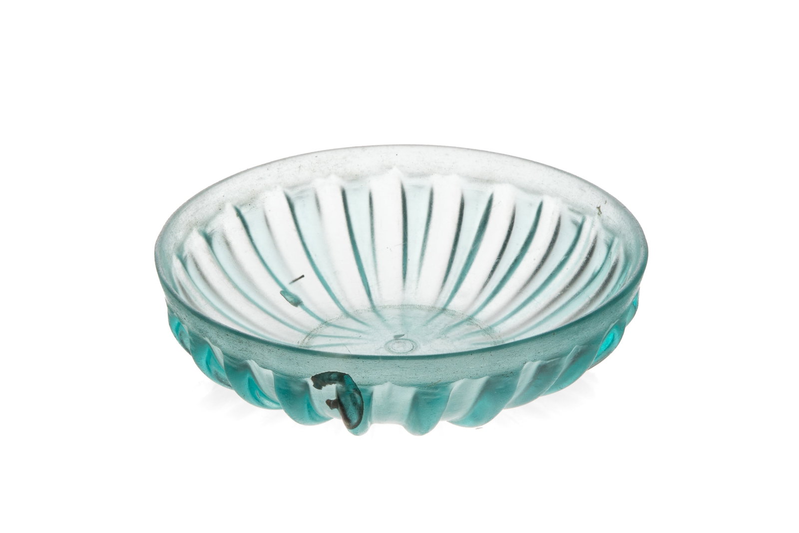 ROMAN BLUE-GREEN RIBBED GLASS BOWL: Blue-green glass bowl in excellent condition, likely made circa first century CE. Technique of blowing molten glass into a ribbed mold to form the prominent exterior vertical ribs was common during th