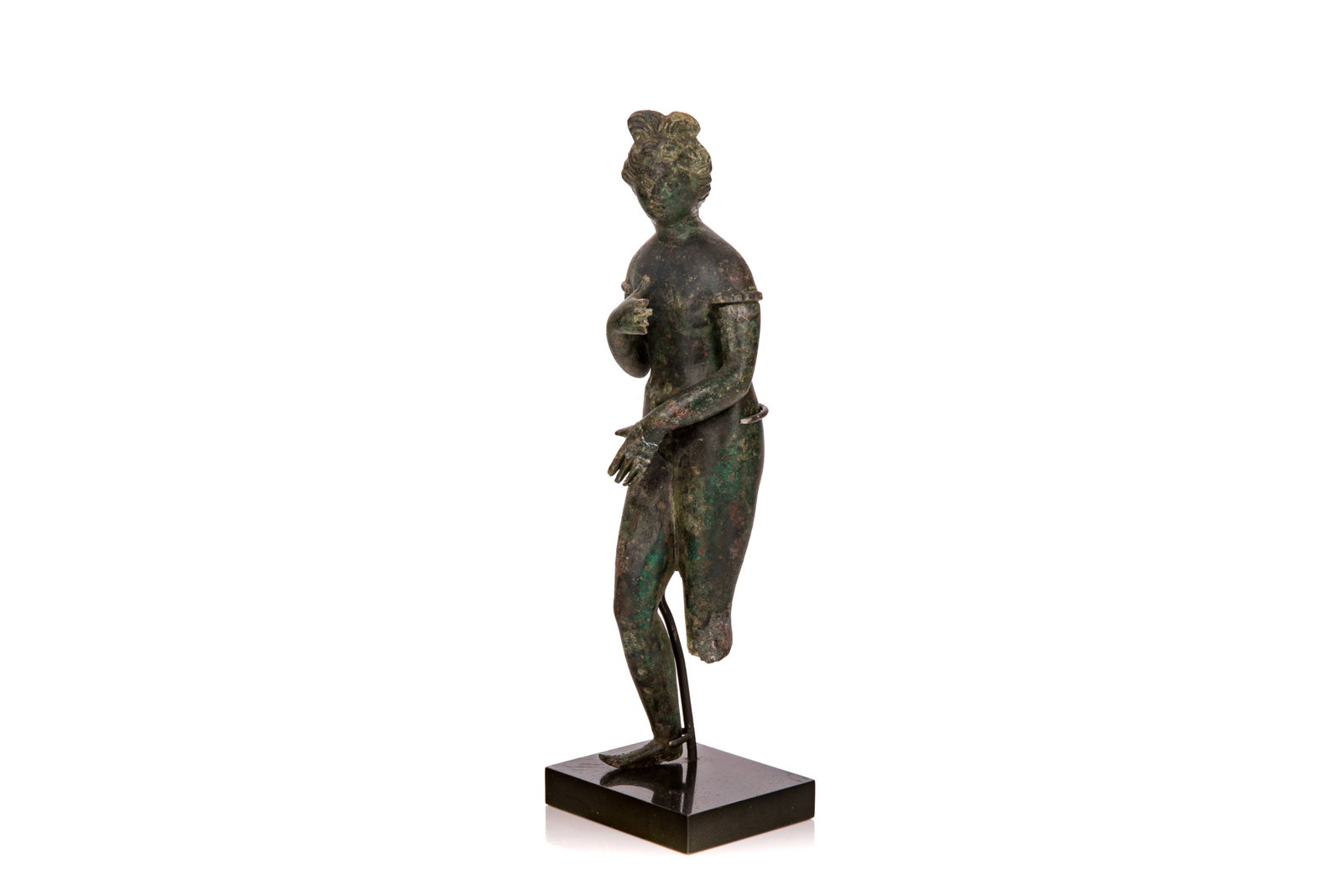 ROMAN BRONZE FIGURE OF VENUS PUDICA: A standing nude figure of the goddess in the classical pose covering breasts and pubis with her hands. H 21cm (8.27")