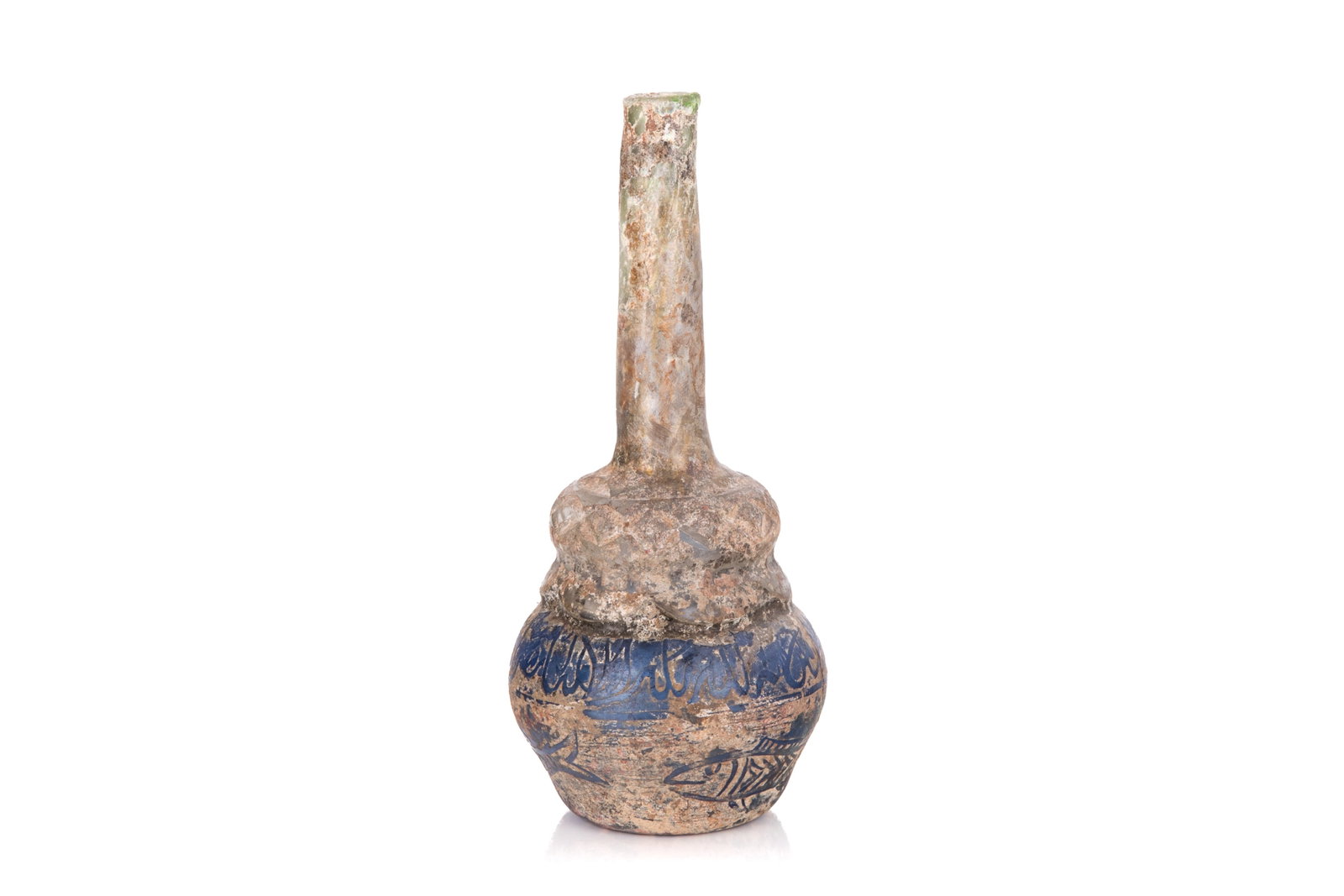 ANCIENT ISLAMIC ANTIQUITY BLUE GLASS VASE: Long-necked vases with Arabic script and fish engraved around the double gourd style body, probably 11th -13th C. H. 9in (22.8cm) Heavily patinated but no chips or cracks of note
