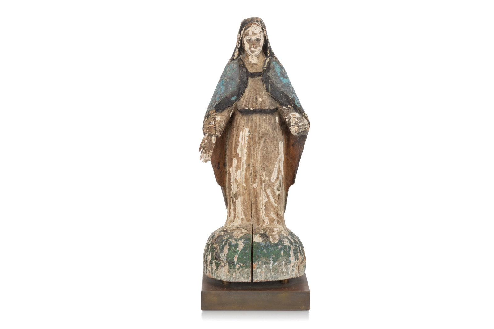 CARVED AND POLYCHROMED WOOD VIRGIN MARY: Depicting the Virgin Mother with her arms outstretched before her in a gesture of openness. Much of its blue and black paint has retained over time. H. 15 1/2in (39.3cm)