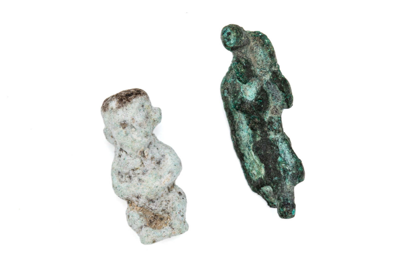 STONE FIGURE & BRONZE PENDANT OF THOTH NEW KINGDOM: Revered as the Egyptian deity of wisdom, writing, magic, and the moon, Thoth was the scribe of the gods and creator of hieroglyphs. He is often depicted as an ibis-headed man, or a baboon. The stone f