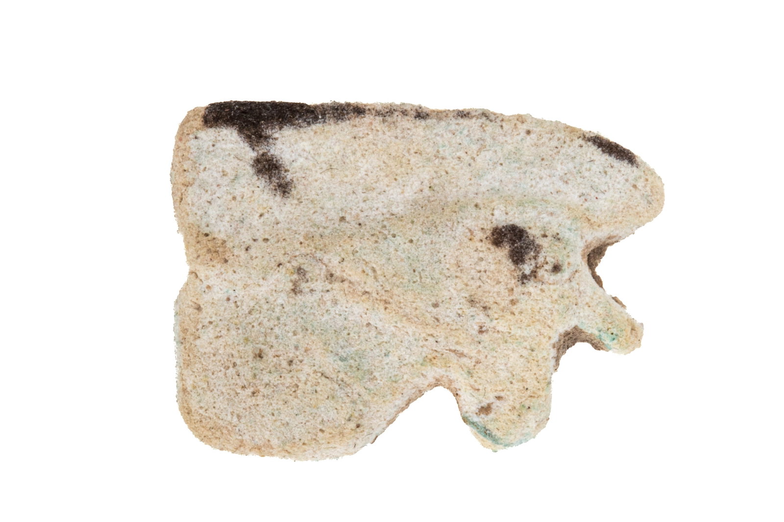 ANCIENT EGYPTIAN FAIENCE EYE OF HORUS: Carved stone of the eye of Horus, the left wedjat-eye, depicting well-being, healing, and protection. Likely a talisman for good luck. H. 3/4in x L. 1 1/4in x D. 1/4in (1.8cm x 3.2cm x 1cm) From a pri