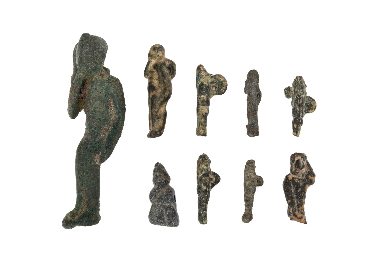 9 BRONZE STATUETTES OF HORUS THE CHILD: Often depicted with a finger to his lips, Horus the Child represents the sidelock of youth, divine healing, and the promise of future kingship. Some of these bronzes feature the god-child with his roy
