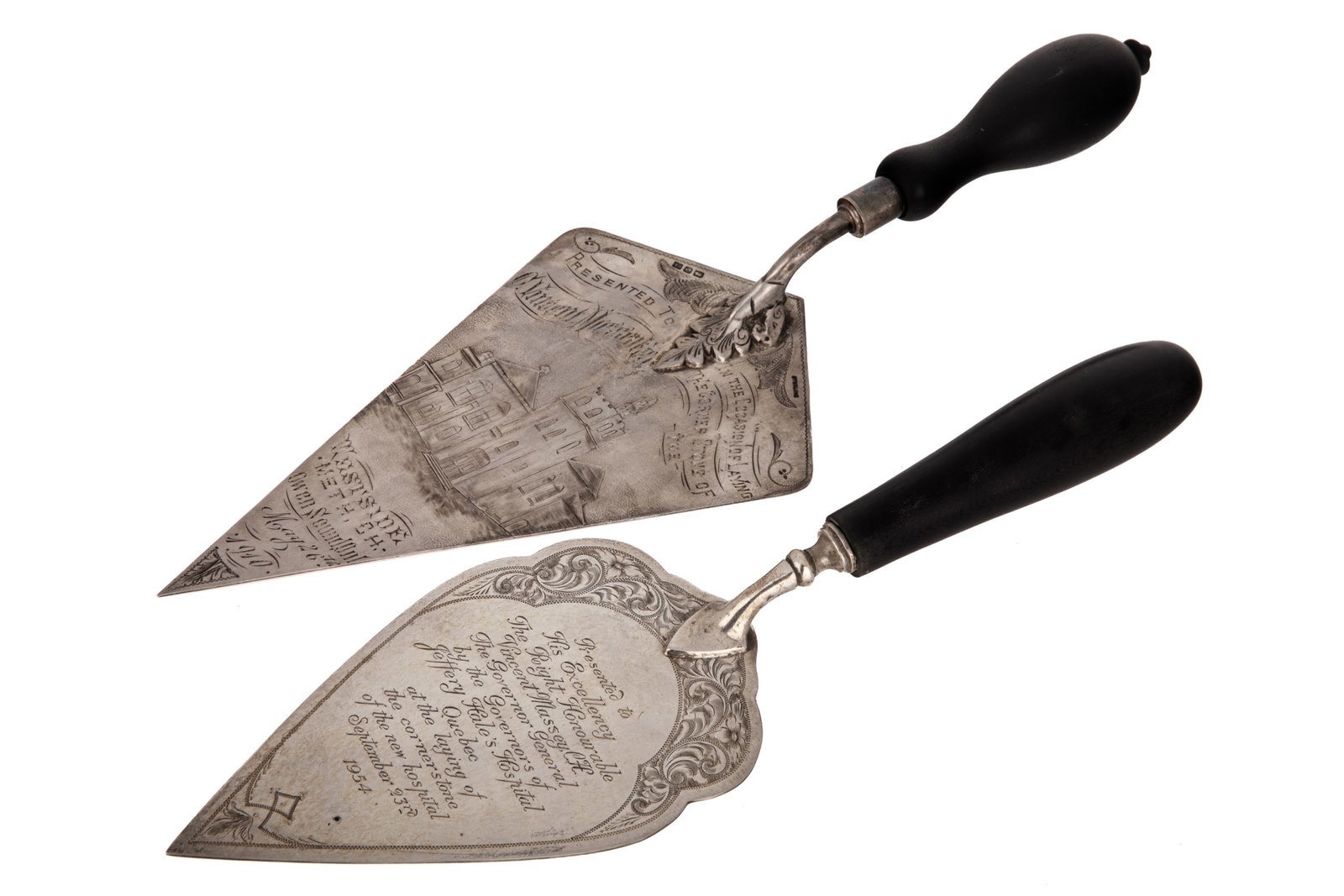 TWO CANADIAN SILVER PRESENTATION TROWLS: Two sterling silver and wooden handled presentation trowels, by Ellis of Toronto and Birks of Montreal. Both with presentation inscriptions. Length 12.5 in 32 cm