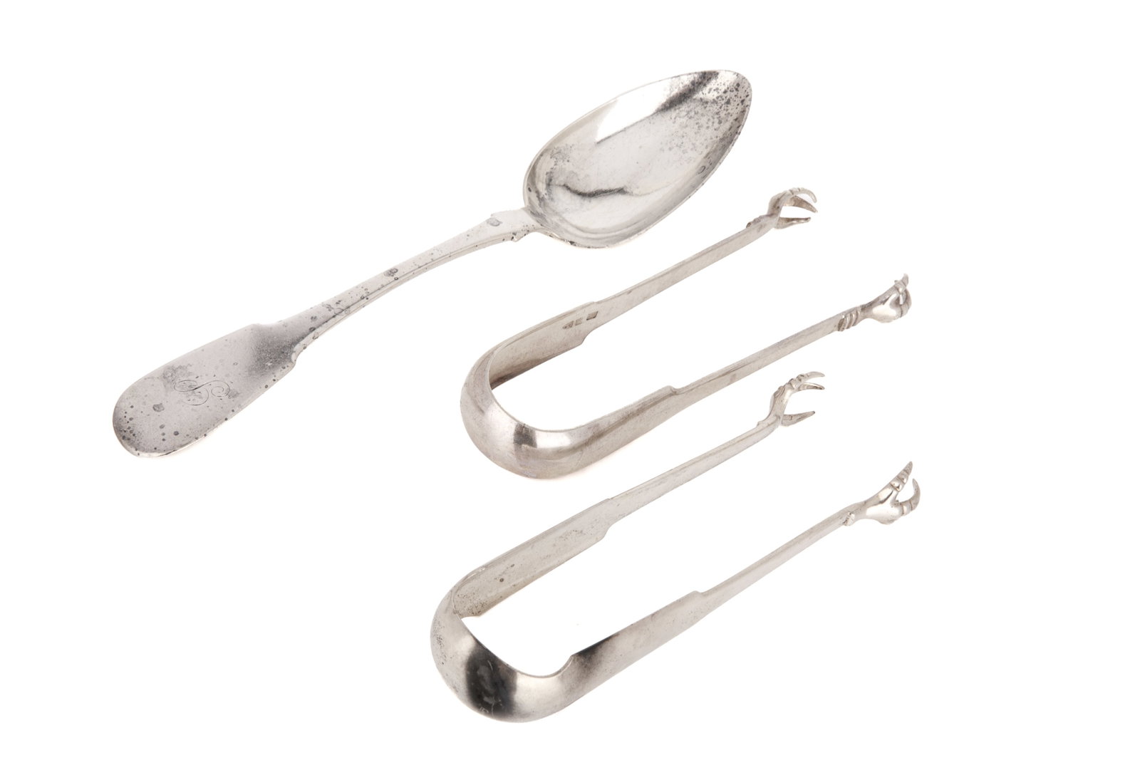CANADIAN ANTIQUE SILVER SUGAR TONGS 174g: Two early 19th century pairs of sterling silver sugar tongs, and a tablespoon, Montreal, by Peter Bohle. Both pairs of tongs have bird claw grips. The table spoon is fiddle pattern. Weight 174 grams L