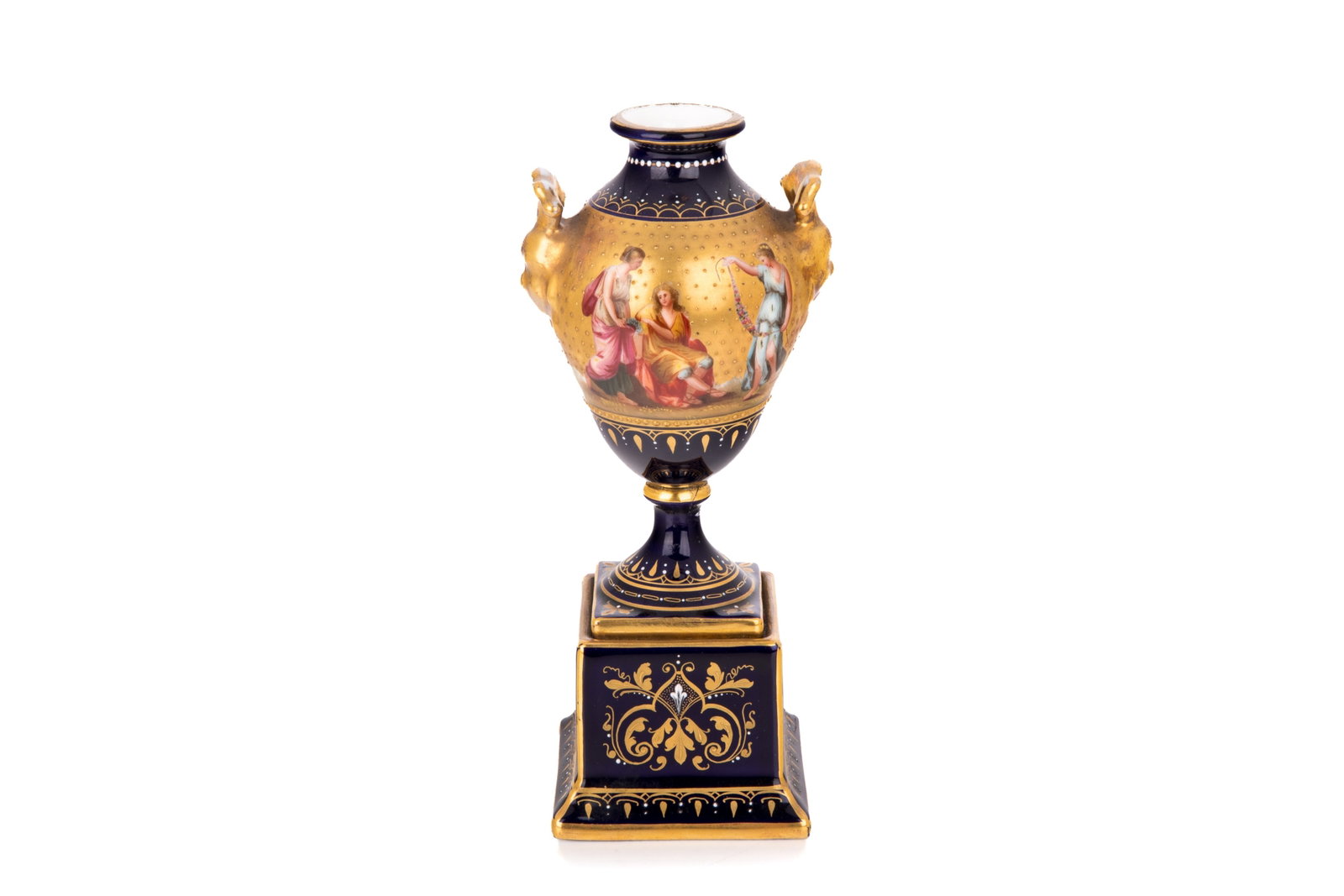 VIENNA PORCELAIN MYTHOLOGICAL TWIN-HANDLED URN: A Vienna style porcelain twin-handled urn on a pedestal base, late 19th or early 20th century. The central body finely hand-painted with continuous classical mythological scenes titled on the bottom "