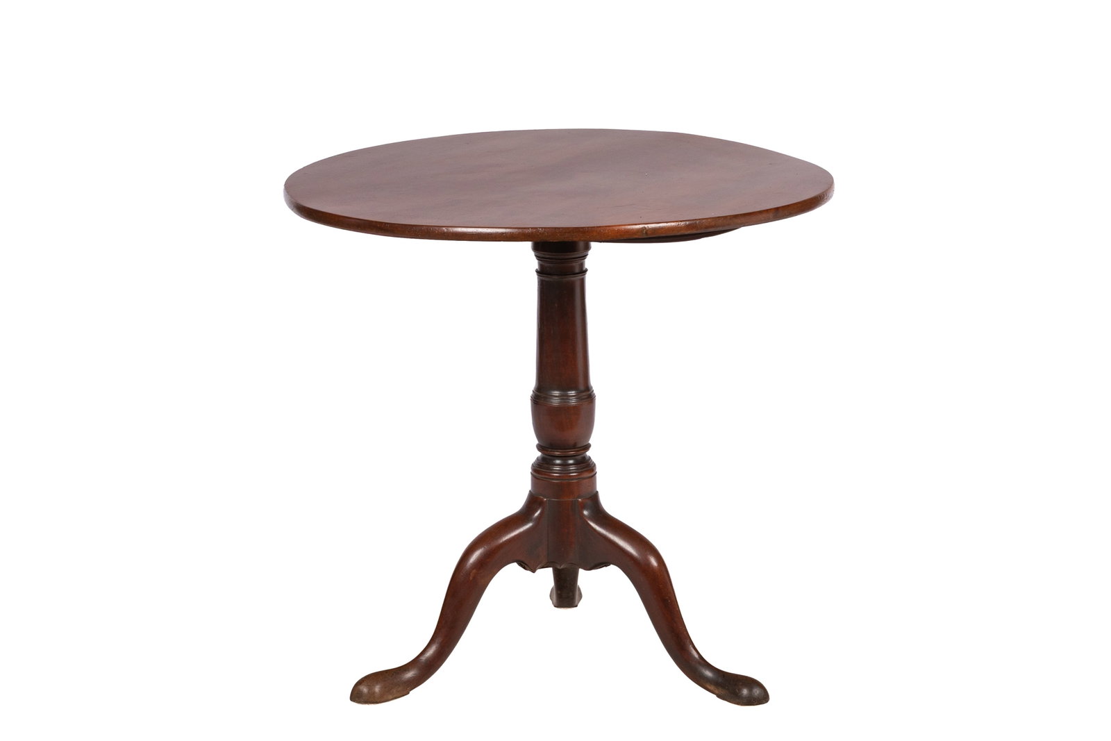 GEORGE III TILT TOP TEA TABLE: Late 18th century. A George III mahogany tripod tea table, having a circular tilting top raised on a turned column pedestal with a cabriole tri-pod base. H. 28in x Dia. 29 1/2in