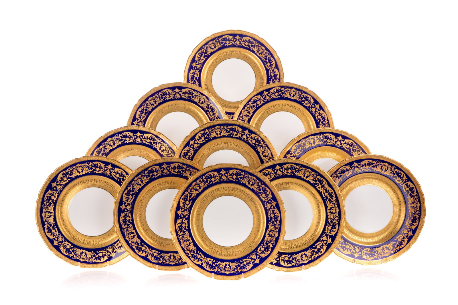 11pcs,ROYAL DOULTON PORCELAIN PLATE FOR OVINGTON'S: Circa 1922-1923. A set of 11 dinner plates made for Ovington's, New York. Featuring rich cobalt blue rims overlaid with gilt scrolling foliage. Bears various date stamps including "10.22" and "2.23", 