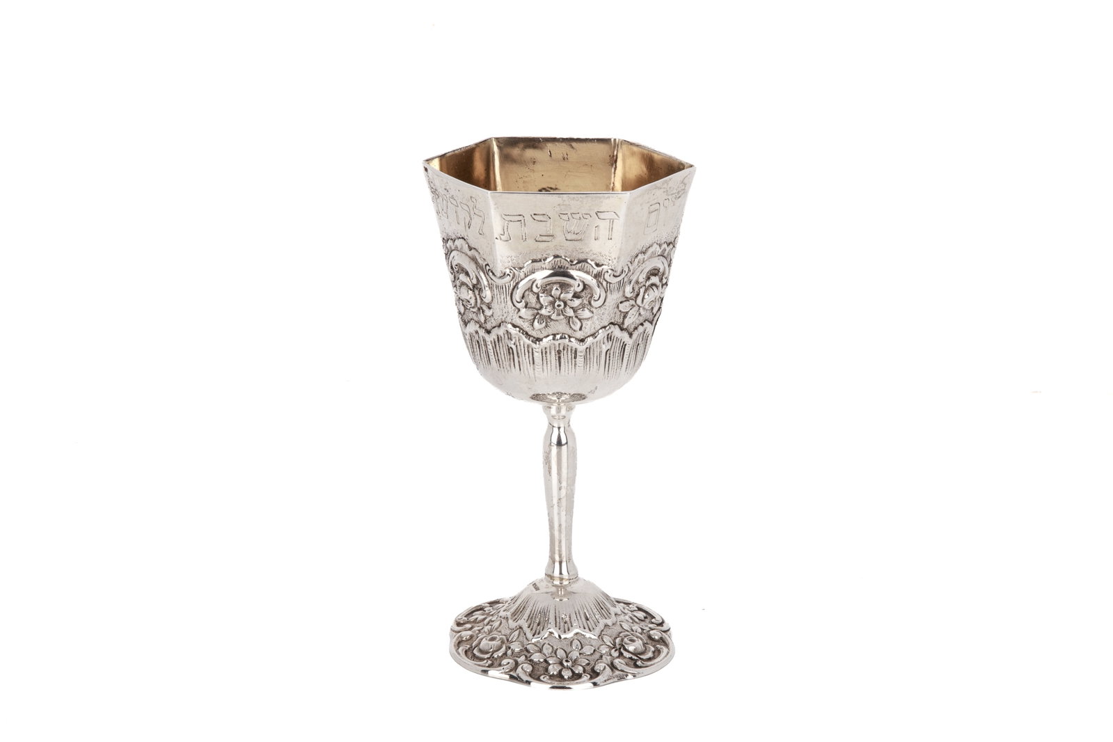 GERMAN SILVER KIDDUSH CUP, 181g: Caste silver body with floral pattern and engraved Hebrew text for Shabbat, marked Germany. H 14cm (5 1/2in)181g