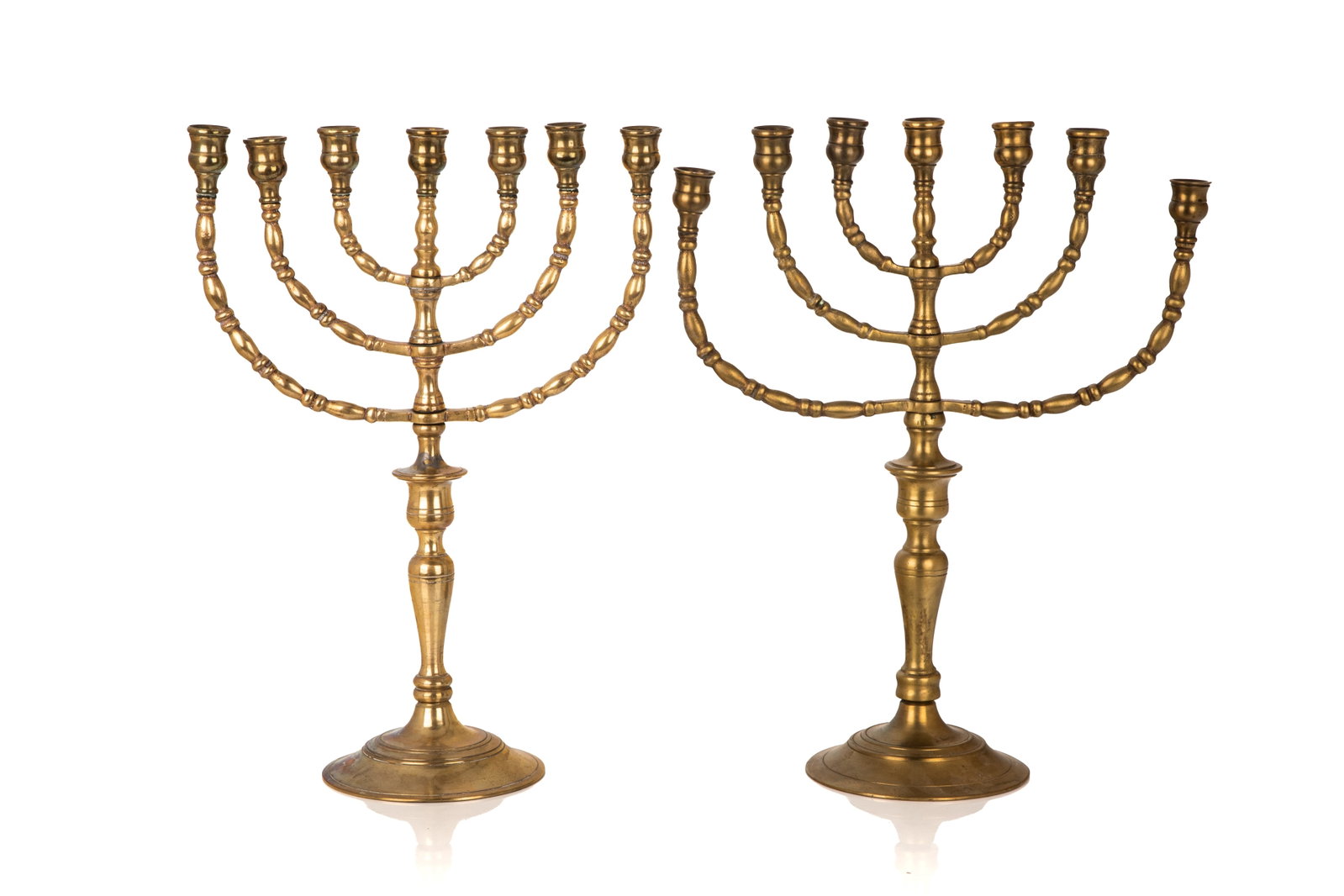 PAIR OF ANTIQUE SEVEN BRANCH BRONZE MENORAHS: H 17in (43cm)