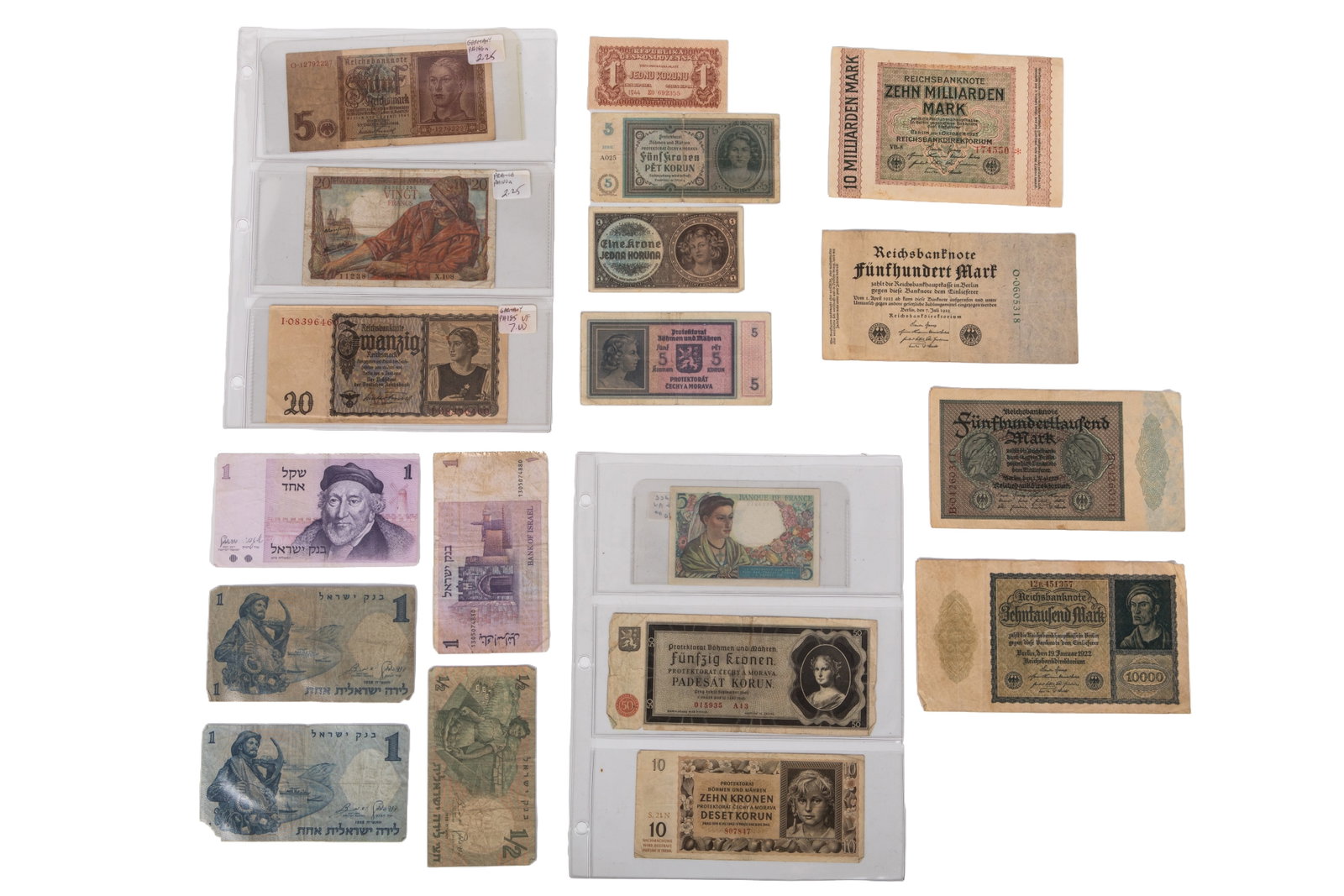 SELECTION OF OLD PAPER CURRENCY BANKNOTES: From Israel dating to 1958, German Reichsmark, Czech Koruna and French Francs.
