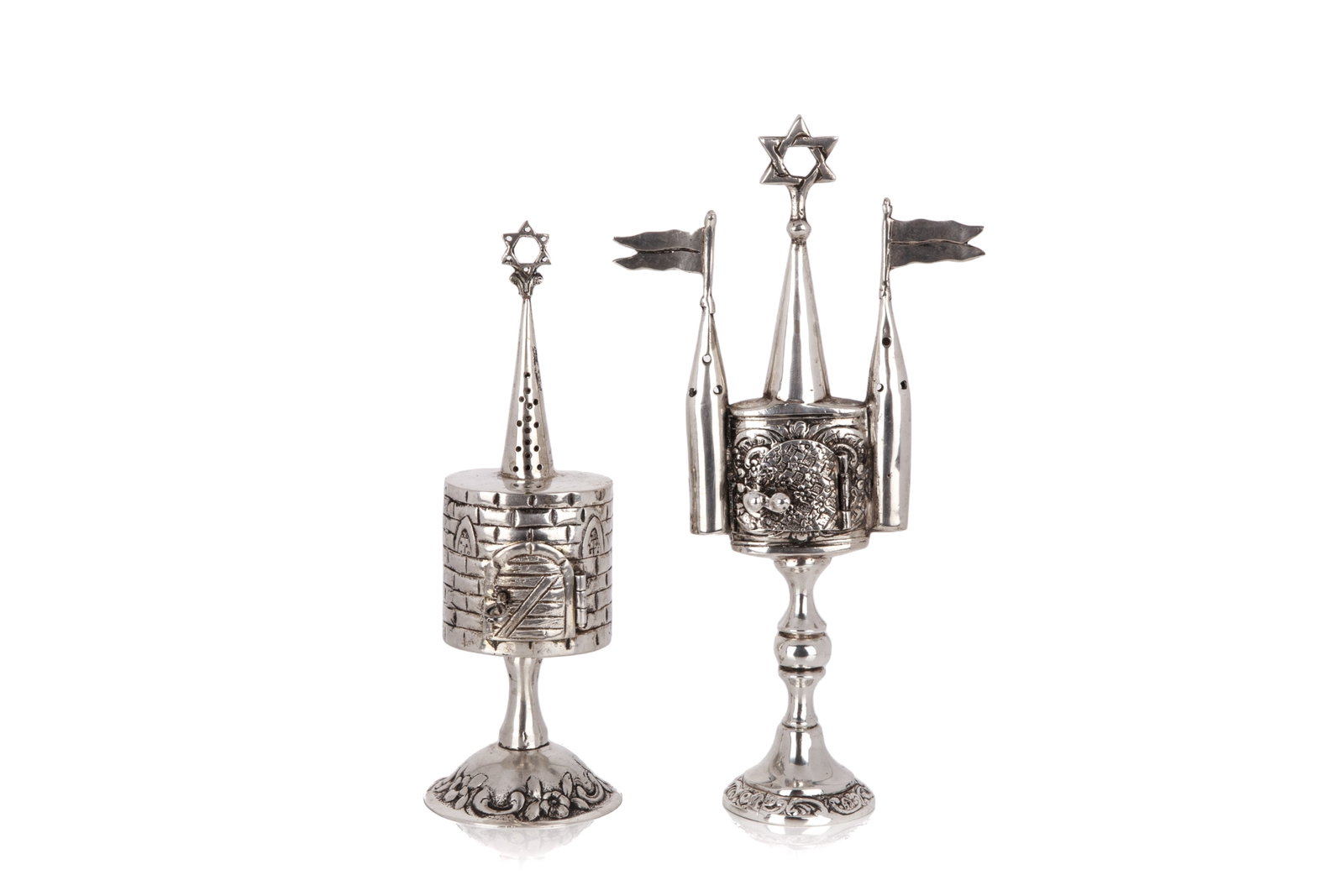 TWO JUDAICA SILVER HAVDALAH SPICE TOWERS, 227g: Both German cast silver with star of David finials and door fronts. H of tallest 18cm (7in) 227g
