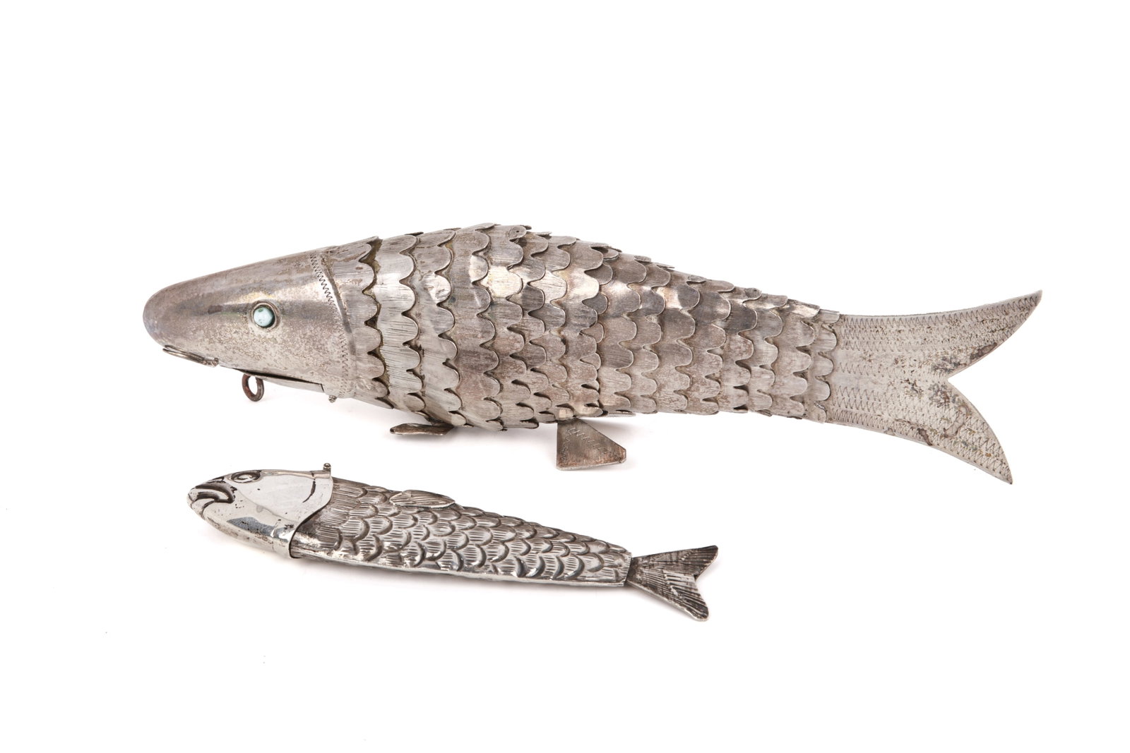 TWO SILVER FISH SHAPED SPICE CONTAINERS: The large fish double stamped .800. L 8 1/4in (21cm) Weight 152g