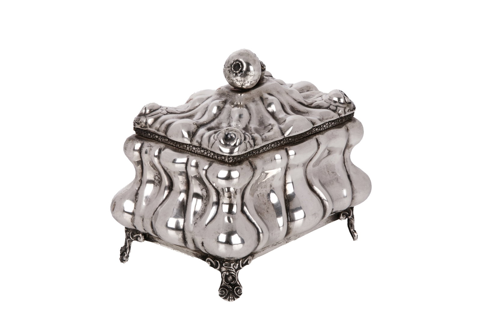 CONTINENTAL ANTIQUE JUDAICA SILVER ETROG BOX, 360g: Lobed body raised on delicate scroll feet, crowned by a distinct cast pear finial. Old Etrog stuffing inside.Weight 360 grams, .800grade H. 5 1/2in x W. 5 1/2in x D. 4in (14cm x 14cm x 10cm)