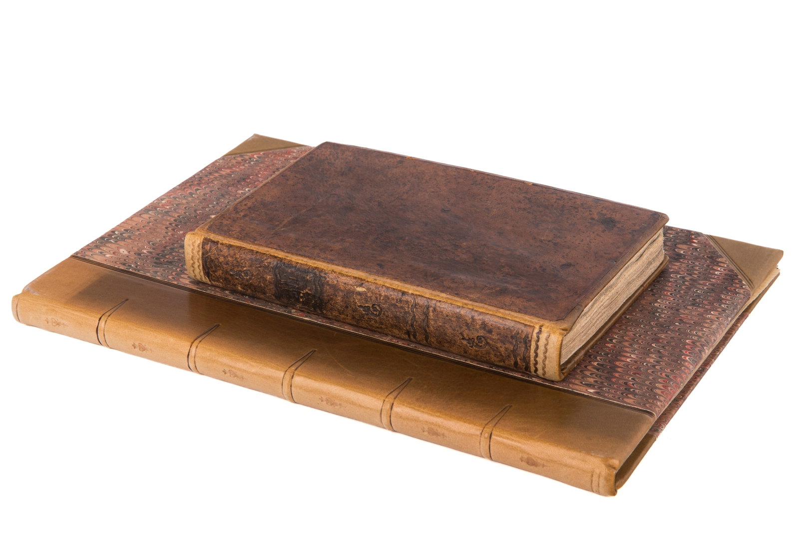 TWO LEATHER BOUND SCHOLARLY RASHI BOOKS: The smaller book of Sefer Kiryah Ne'Emanah, printed Germany 1805. And Levush Haorah, 19th C with hand written notes and doodles.