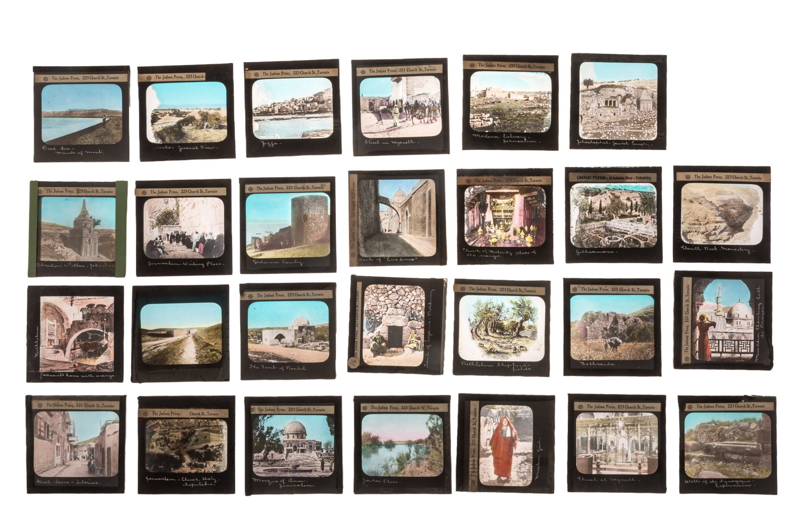 COLLECTION OF GLASS SLIDES OF ISRAEL: Assorted slides identifiying landscapes, buildings and tourist sites in Israel.