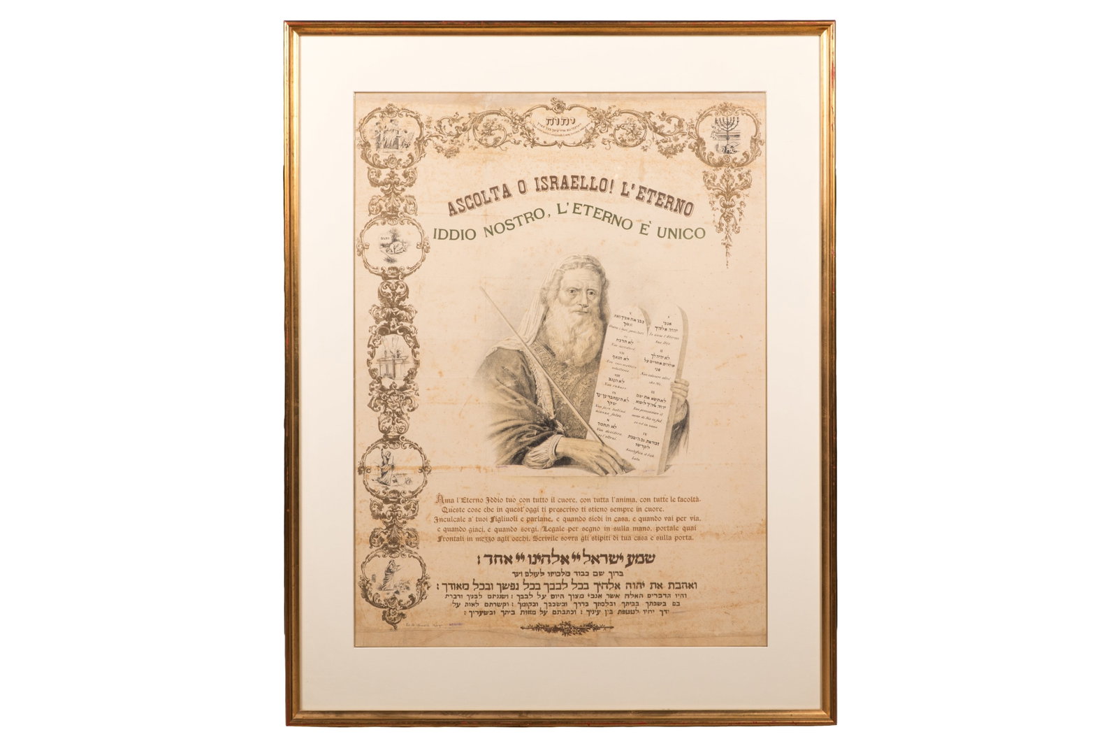 ITALIAN JUDAICA POSTER FOR THE SHEMA PRAYER: Ascolta O Israello! L'Eterno. Iddio Nostro, L'Eterno E Unico italian poster depicting Moses holding the ten commandment tablets above the Hebrew prayer Shema Israel.In modern frame. Overall H 37 1/2