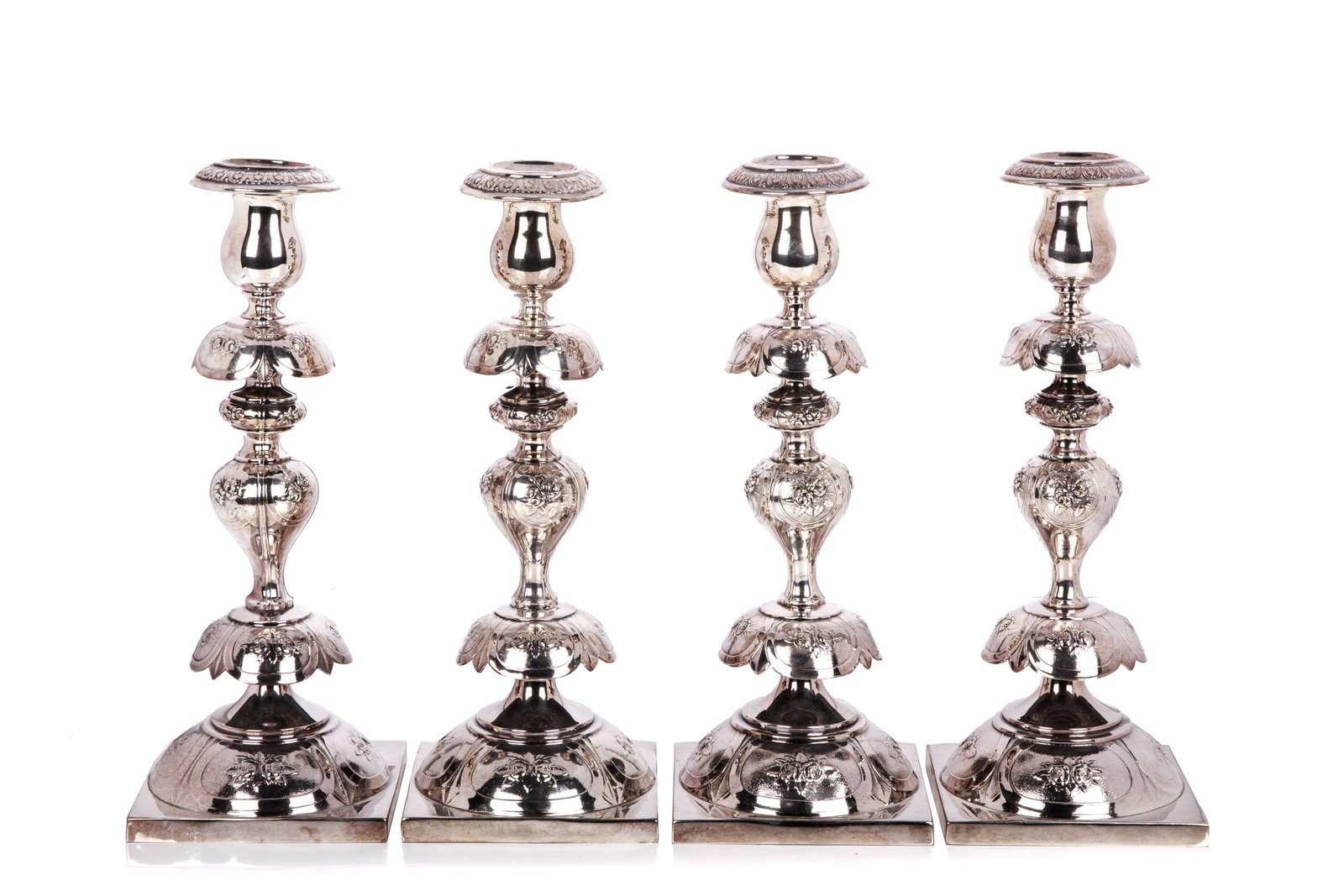 FOUR POLISH SILVERPLATED CANDLESTICKS (1 of 2)