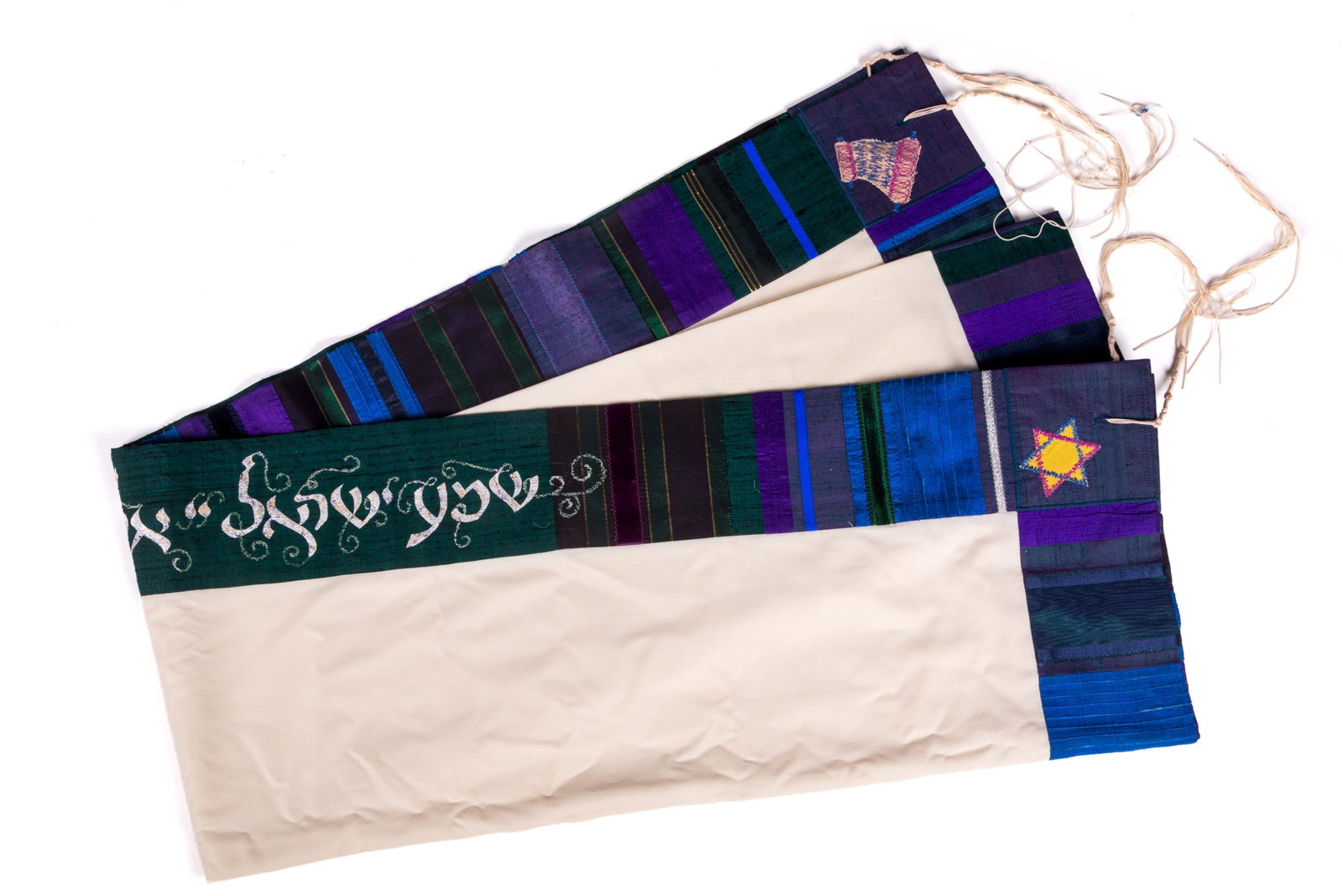 JEWISH TALLIT PRAYER SHAWL: Cream wool body with mixed silk and satin border, each corner is decorated with a unique Jewish symbol including a Star of David, Shofar, Menorah.