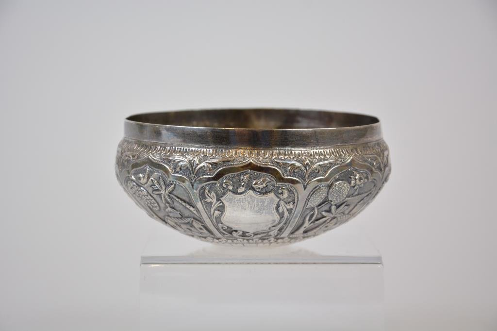 Cutch Colonial Indian Silver Bowl: Embossed with buildings and floral engraving, empty crest. 111 g. Dia 11.1 cm. (4 3/8 in.)