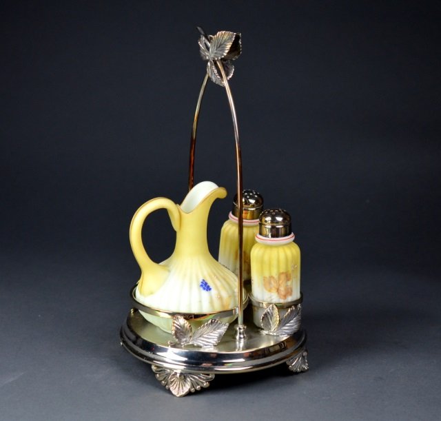 Mount Washington glass cruet set: three piece cruet set on silverplate stand.